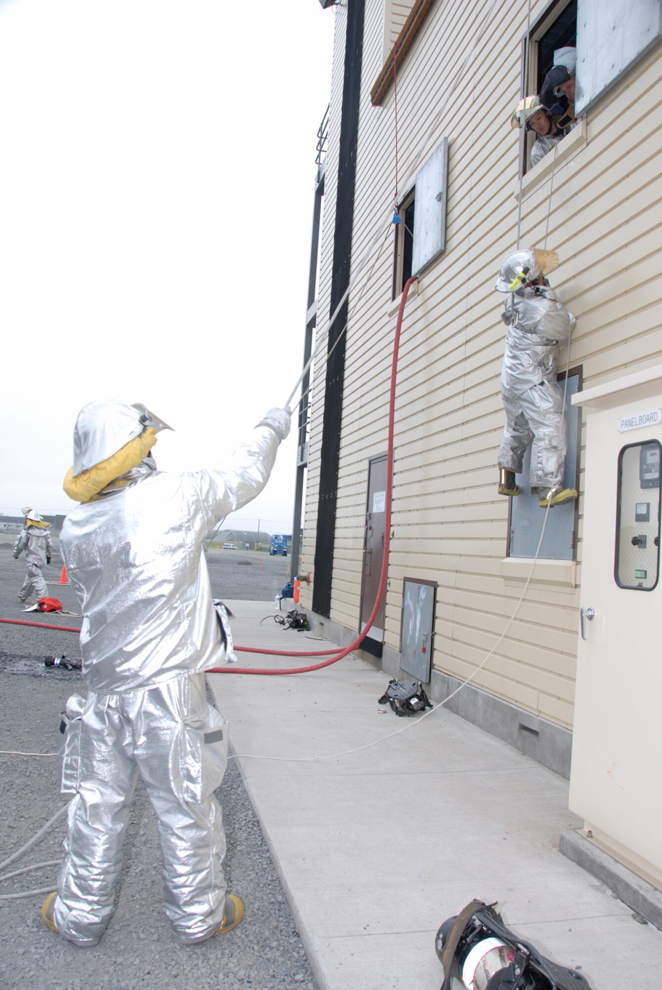 MISAWA AIR BASE, Japan -- Misawa's firefighters practice the rope slide as an emergency evacuation technique during firefighter training on June 13, 2008. The firefighters are unique in that they received advanced training in escape and life-saving techniques.  (U.S. Air Force photo by Senior Airman Laura R. McFarlane)