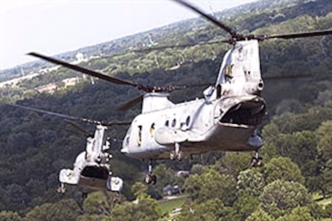 U.S. Marine Corps aviation crews aboard CH-46 Sea Knight helicopters prepare for a formation landing during urban flight operations training in Indianapolis, June 16, 2008.
The Marines are assigned to Marine Medium Helicopter Squadron 264 from Marine Corps Air Station, New River, N.C. The squadron is part of the 26th Marine Expeditionary Unit training for deployment later this year.