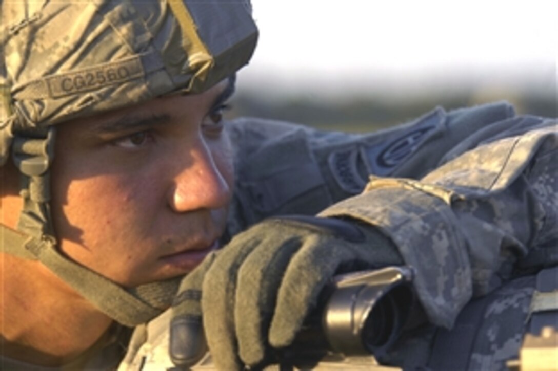 A U.S. Army soldier assigned to the 82nd Airborne Division, 505th Parachute Infantry Regiment mans a perimeter post during a joint forcible entry exercise on Fort Bragg, N.C., June 17, 2008. The exercise is a joint airdrop designed to enhance service cohesiveness between Army and Air Force personnel in executing large-scale heavy equipment and troop movement. 