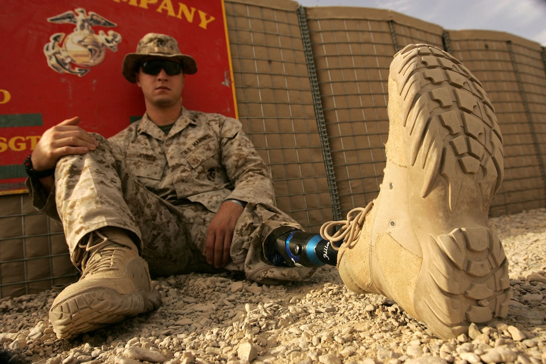 Corporal Garrett S. Jones, an amputee who was injured in 2007 by an insurgent’s bomb during his unit’s deployment to Iraq, shows his prosthetic leg. Jones is a 23-year-old Newberg, Ore., native.