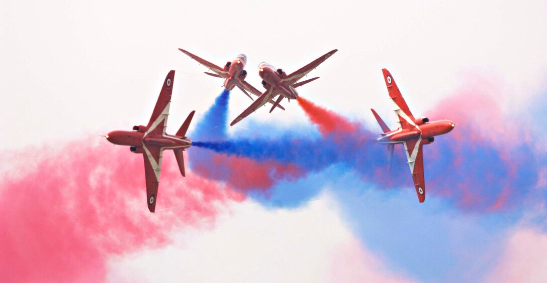 LANGLEY AIR FORCE BASE, Va. – The Royal Air Force Red Arrows perform the “Gypo Break” maneuver during AirPower over Hampton Roads June 21.  Langley’s open house is an annual event that helps educate the public, increase recruiting and show appreciation to the local community.  “It's a chance to get people informed, involved and excited,” said Lt. Col. Brady Merrill, director of AirPower over Hampton Roads and chief of 1st Fighter Wing Plans, Programs and Evaluations. (U.S. Air Force photo/Senior Airman Barry Loo) 