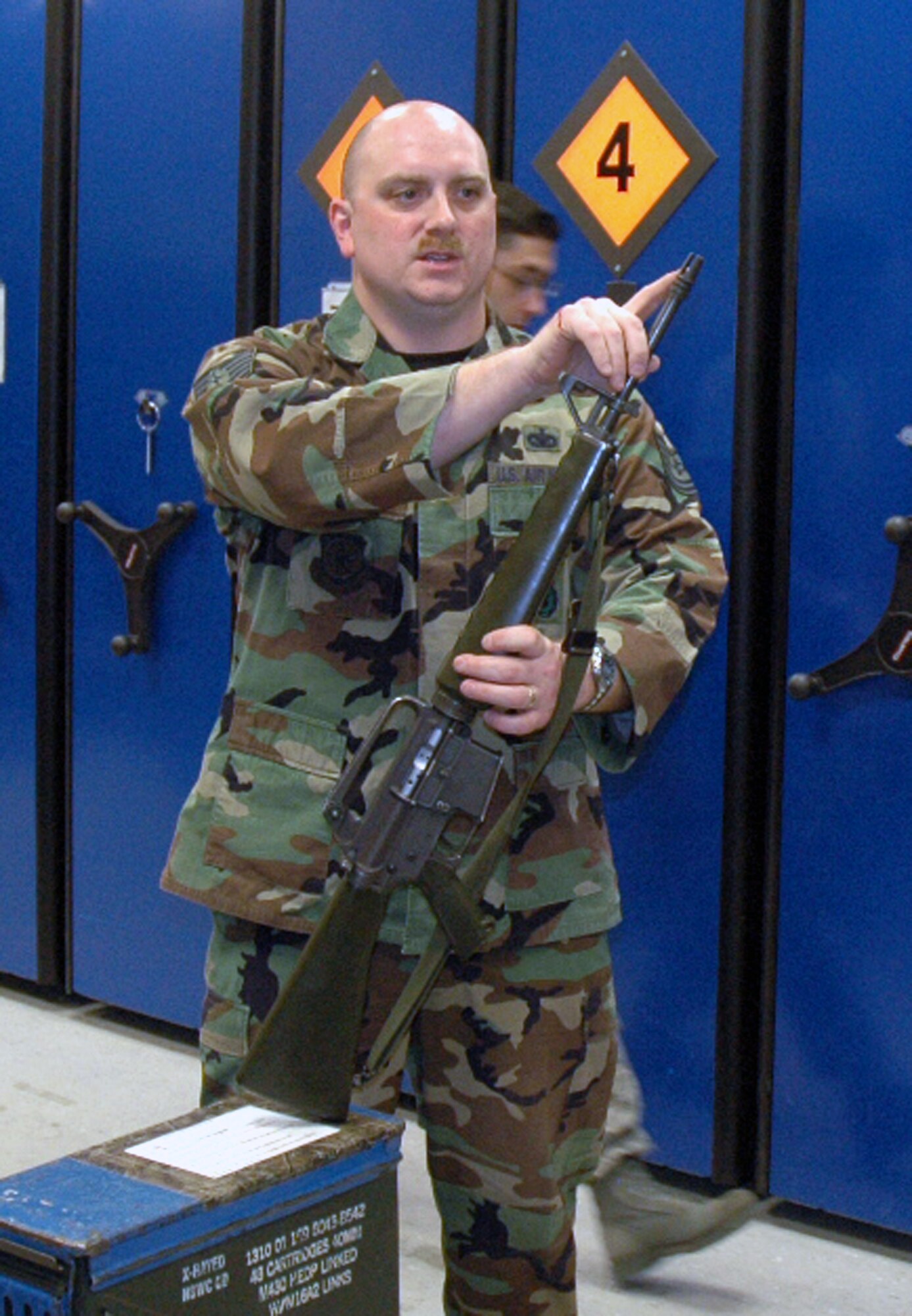 Tech. Sgt. Sean Heraty, U.S. Air Force Expeditionary Center armory, works on an M-16 inside the armory June 19, 2008, on Fort Dix, N.J.  The USAF EC's armory is one of the largest in the Air Force and holds the Air Force's largest inventory of foreign weapons on the U.S.' East Coast.  Largely, the Center's weapons are used for training in numerous expeditionary field courses.  (U.S. Air Force Photo/Tech. Sgt. Scott T. Sturkol)