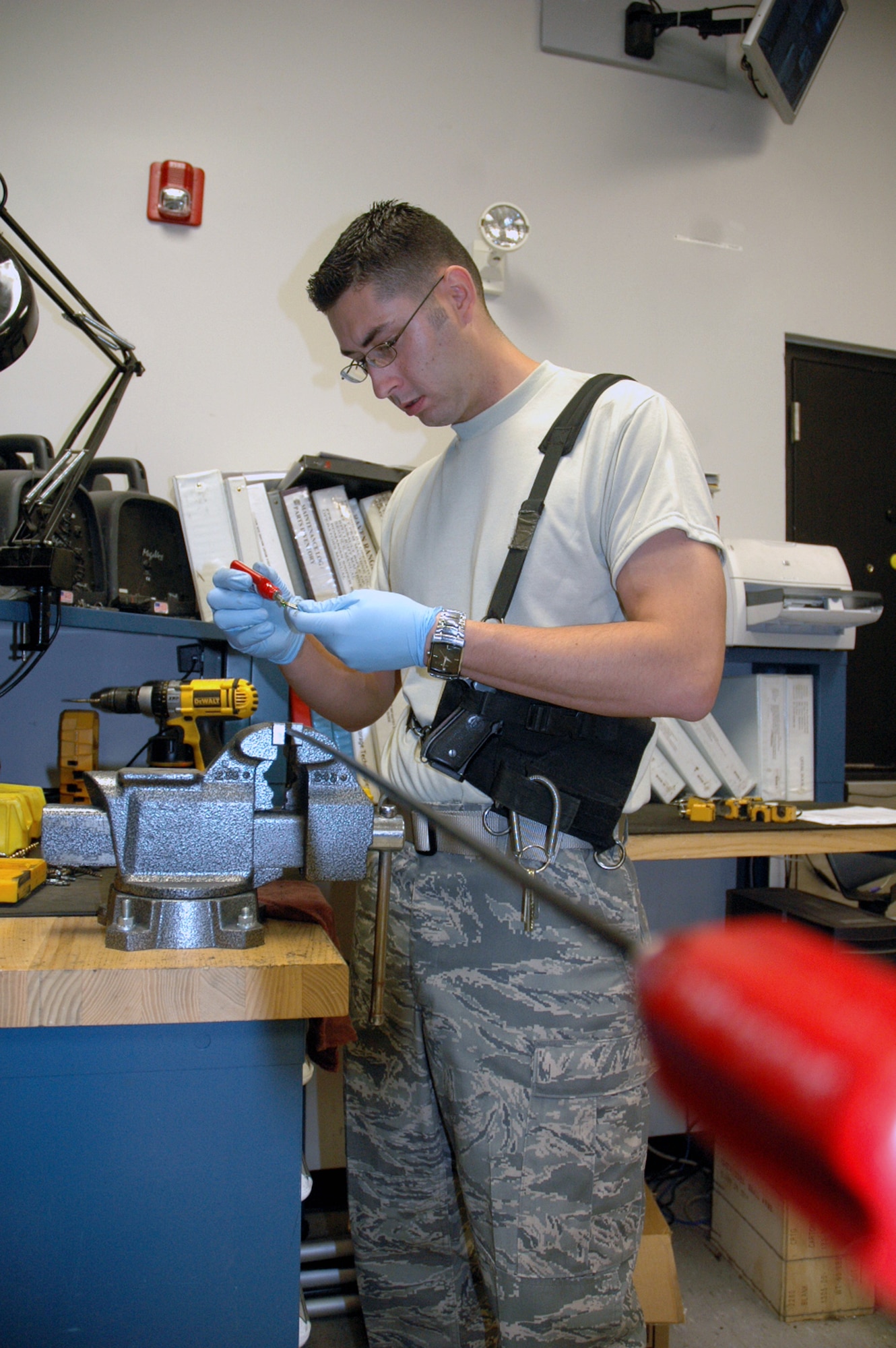 Staff Sgt. Ryan Marcotte, U.S. Air Force Expeditionary Center armory, works on repairing gun cleaning equipment inside the armory June 19, 2008, on Fort Dix, N.J.  The USAF EC's armory is one of the largest in the Air Force and holds the Air Force's largest inventory of foreign weapons on the U.S.' East Coast.  Largely, the Center's weapons are used for training in numerous expeditionary field courses.  (U.S. Air Force Photo/Tech. Sgt. Scott T. Sturkol)