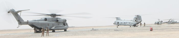 Helicopters prepare to depart FOB Dwyer after a successful resupply mission.