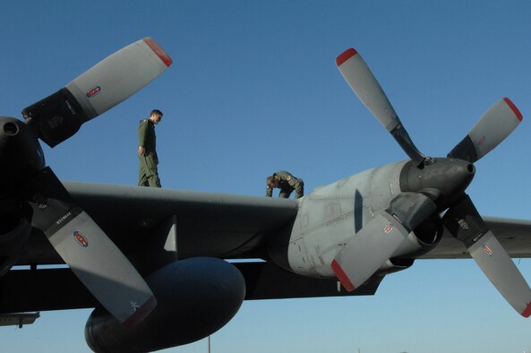 Master Sgt. Bill McCaleb, 42nd Electronic Combat Squadron Flight Engineer, trains Master Sgt. Pete Peterson, 43rd Electronic Combat Squadron flight engineer, on pre-flight inspections for a C-130 aircraft prior to take off here June 17. (U.S. Air Force photo/Airman 1st Class Noah R. Johnson)