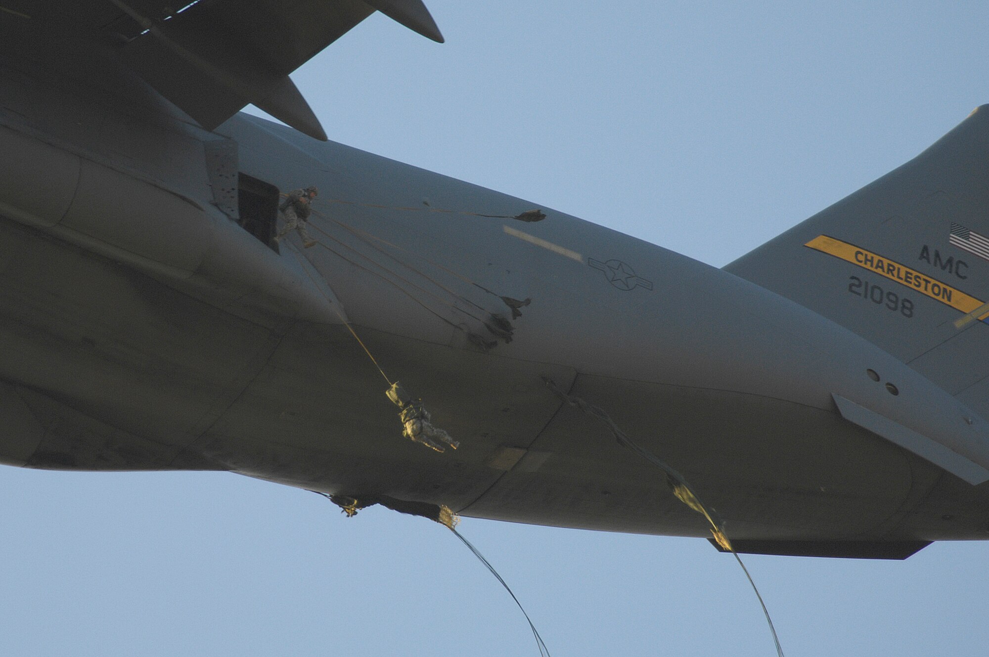 Members of the 505th Parachute Infantry Regiment, 82nd Airborne Division, jump from a Charleston Air Force Base, S.C. C-17 Globemaster III during Joint Forcible Entry Exercise at Pope Air Force Base and Fort Bragg, N.C., on June 18. JFEX is a joint airdrop designed to enhance service cohesiveness between U.S. Army and Air Force personnel allowing both services an opportunity to properly execute large-scale  heavy equipment and troop movement.  (U.S. Air Force photo by Airman 1st Class Daniel Owen)