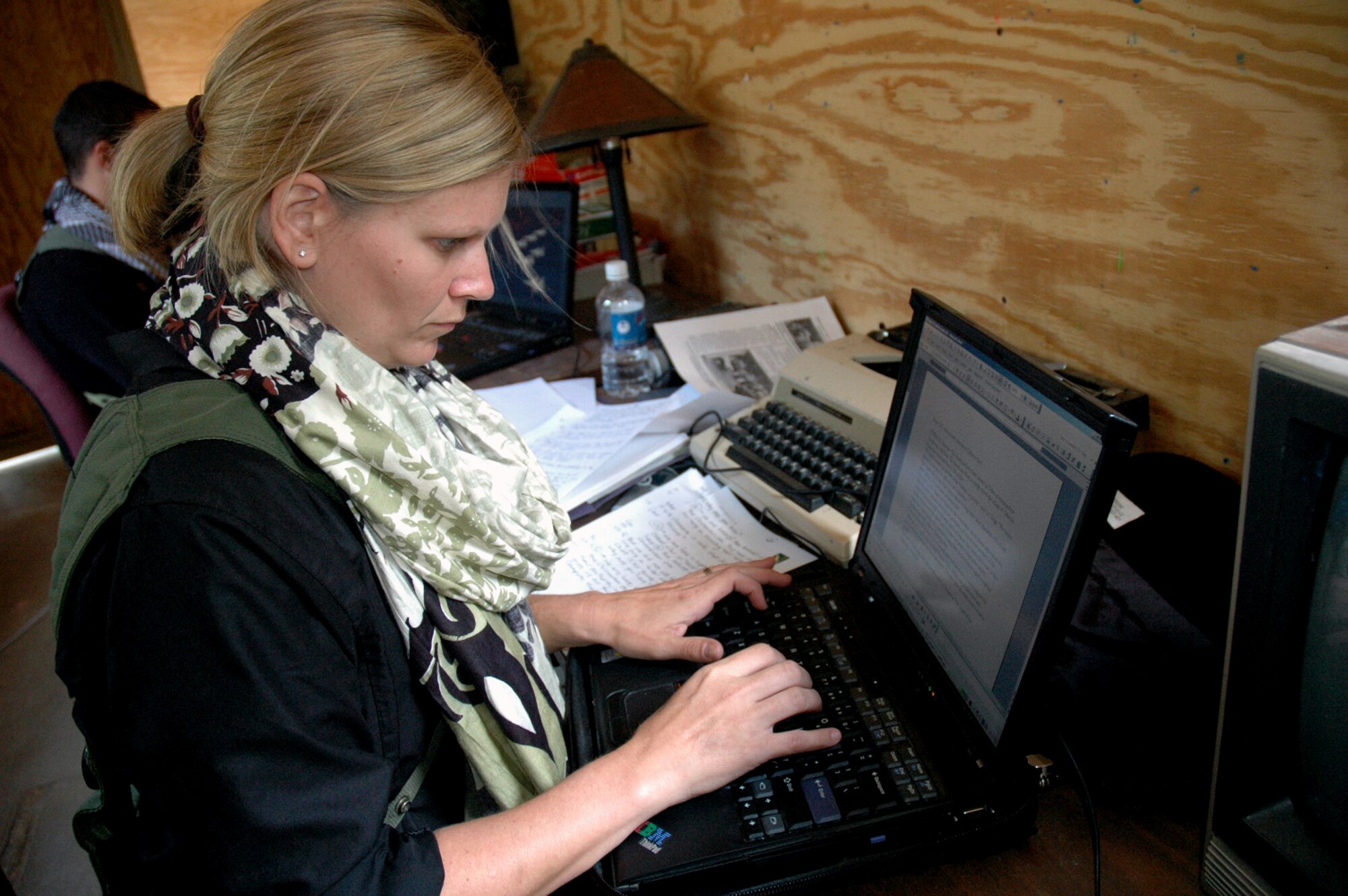 Staff Sgt. Stacia Zachary, a 'media' role player for Air Force Exercise Eagle Flag 08-5, works on the 'local paper' for the exercise June 21, 2008, at Naval Air Engineering Station Lakehurst, N.J.  Sergeant Zachary is one of numerous role players for the exercise whose job it is to make the exercise as realistic as possible.  Eagle Flag is operated by the U.S. Air Force Expeditionary Center's Expeditionary Operations School and 421st Combat Training Squadron at Fort Dix, N.J., and tests and trains Airmen in expeditionary combat support skills.  Sergeant Zachary is from the 96th Air Base Wing public affairs office, Eglin Air Force Base, Fla.  (U.S. Air Force Photo/Tech. Sgt. Scott T. Sturkol)