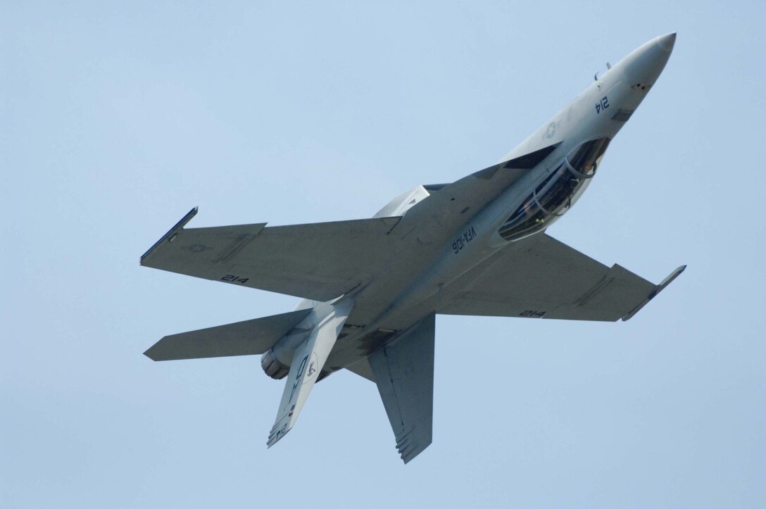 LANGLEY AIR FORCE BASE, Va. – An F-18 performs maneuvers during AirPower over Hampton Roads here June 21. Langley’s open house is an annual event that helps educate the public, increase recruiting and show appreciation to the local community. “It's a chance to get people informed, involved and excited,” said Lt. Col. Brady Merrill, director of AirPower over Hampton Roads and chief of 1st Fighter Wing Plans, Programs and Evaluations. (U.S. Air Force photo/Senior Airman Barry Loo)