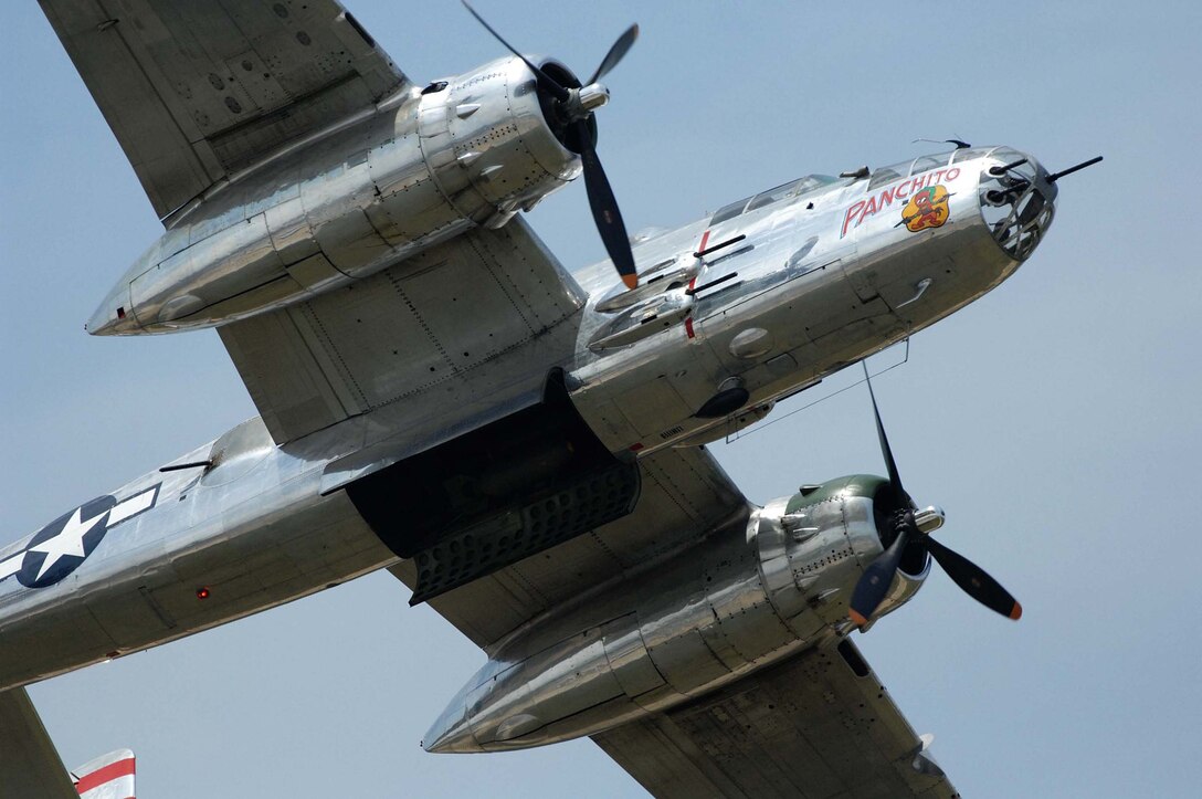 LANGLEY AIR FORCE BASE, Va. – A World War II era B-25 Mitchell bomber performs maneuvers during AirPower over Hampton Roads here June 21. Langley’s open house is an annual event that helps educate the public, increase recruiting and show appreciation to the local community. “It's a chance to get people informed, involved and excited,” said Lt. Col. Brady Merrill, director of AirPower over Hampton Roads and chief of 1st Fighter Wing Plans, Programs and Evaluations. (U.S. Air Force photo/Senior Airman Barry Loo)