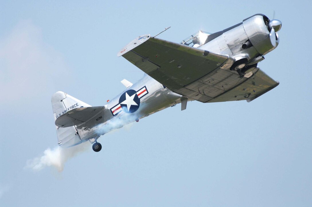 LANGLEY AIR FORCE BASE, Va. -- Bill Leff flies a T-6 Texan during AirPower over Hampton Roads here June 21. Langley’s open house is an annual event that helps educate the public, increase recruiting and show appreciation to the local community. (U.S. Air Force photo/Senior Airman Barry Loo)