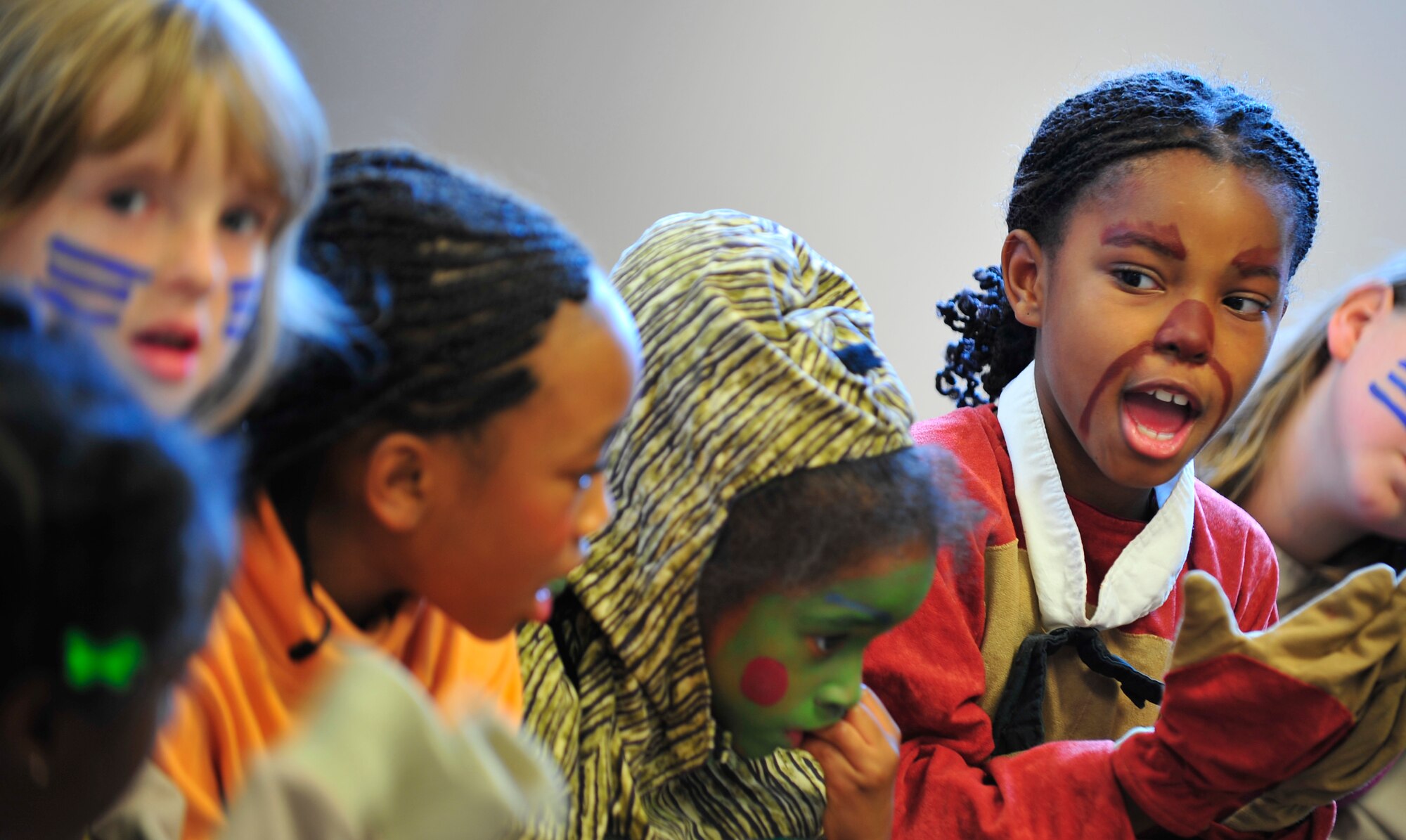 MOODY AIR FORCE BASE, Ga -- Local children at the Missoula Children's Theatre camp practice before their performance of the "Amazing Adventures of Robinson Crusoe" here June 20. The Missoula Children's Theatre is a traveling theatre group that tours the nation hosting children plays. (U.S. Air Force photo by Senior Airman Schelli Jones)