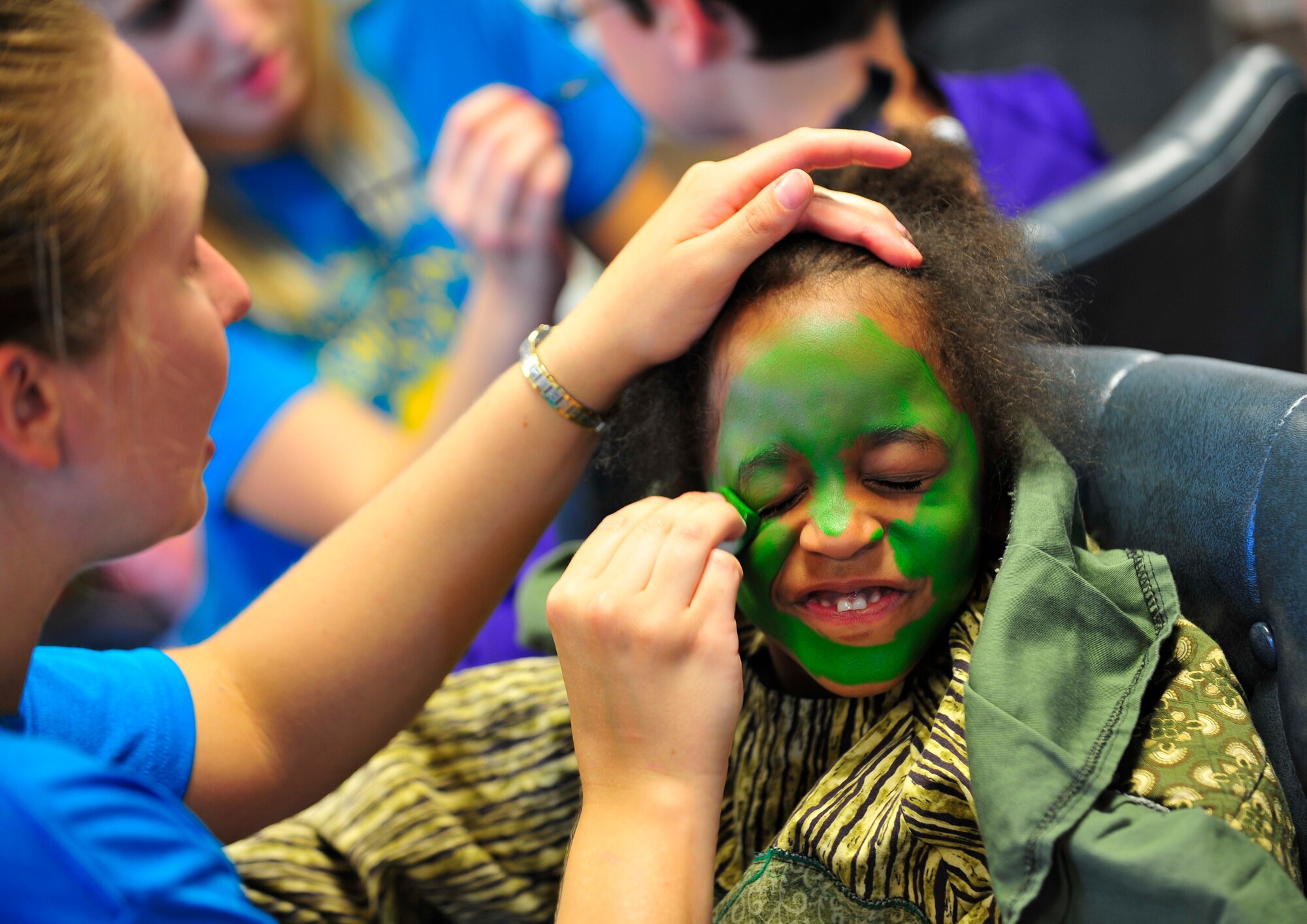 MOODY AIR FORCE BASE, Ga -- Samauria Pace, daughter of Staff Sgt. Shaquana Pace, 23rd Force Support Squadron, gets her make-up done before her perfomance in the "Amazing Adventures of Robinson Crusoe" here June 20. Samauria participated in the Missoula Children's Theatre camp here June 16-20. (U.S. Air Force photo by Senior Airman Schelli Jones)