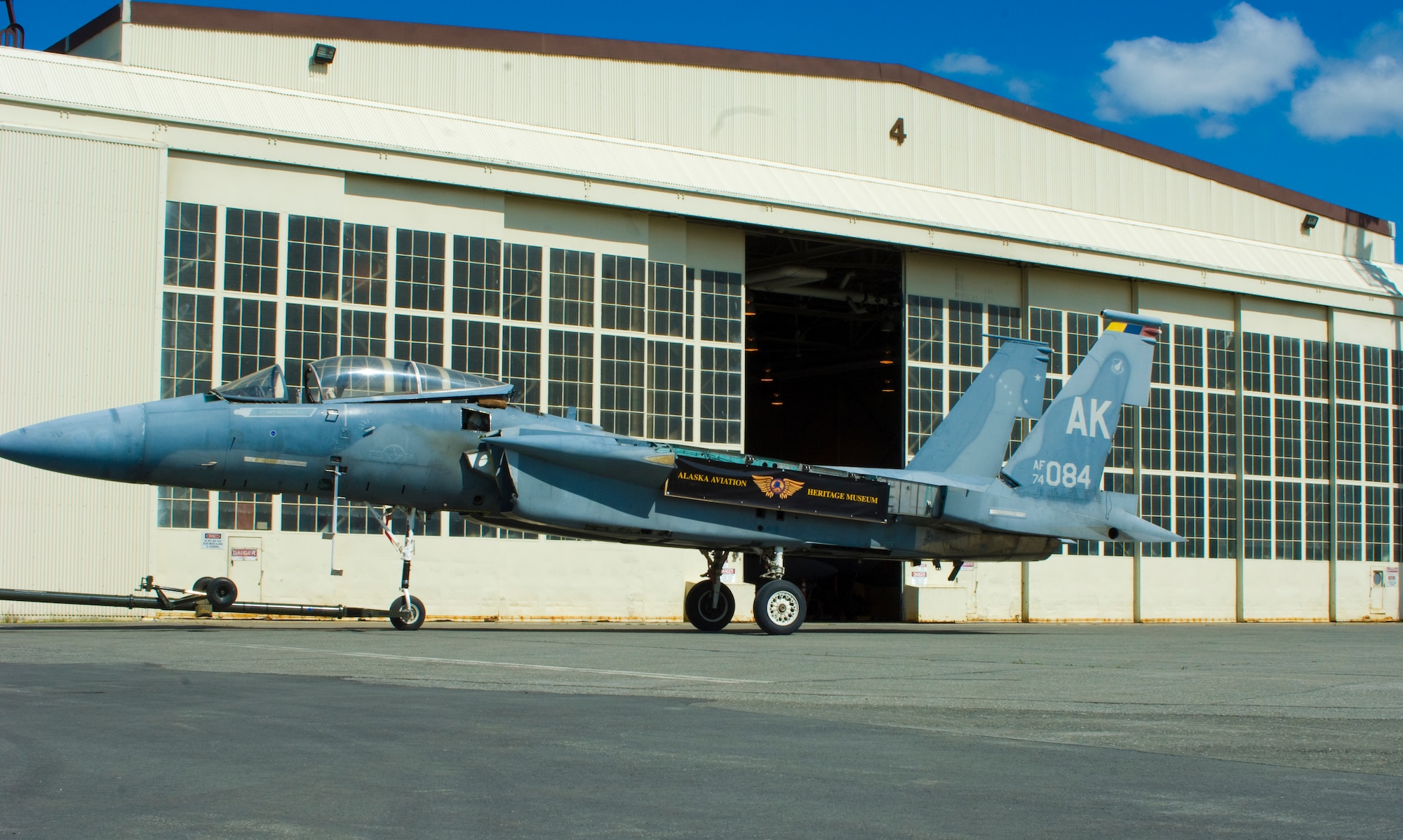 ELMENDORF AIR FORCE BASE, Alaska -- The retired F-15 sits in front of Hangar 4 waiting to be towed to the Alaska Aviation Heritage Museum June 13. This ground instructional training aircraft was transferred to the AAHM in Anchorage where it will be restored and displayed. It is one of two GITA birds to be transferred to the museum. (U.S. Air Force photo by Airman 1st Class David Carbajal)