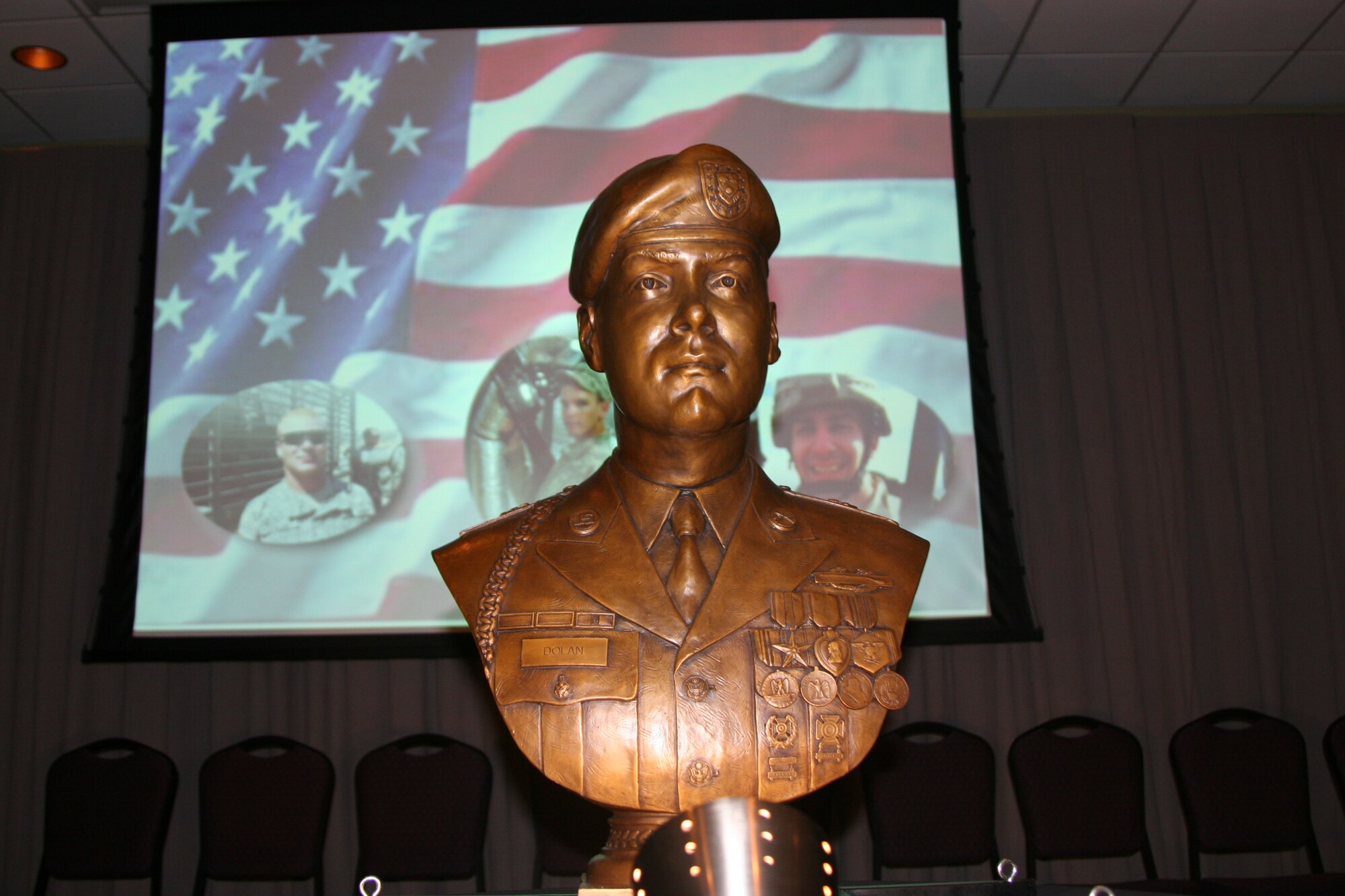 Bronze bust of Spc. Daniel G. Dolan.