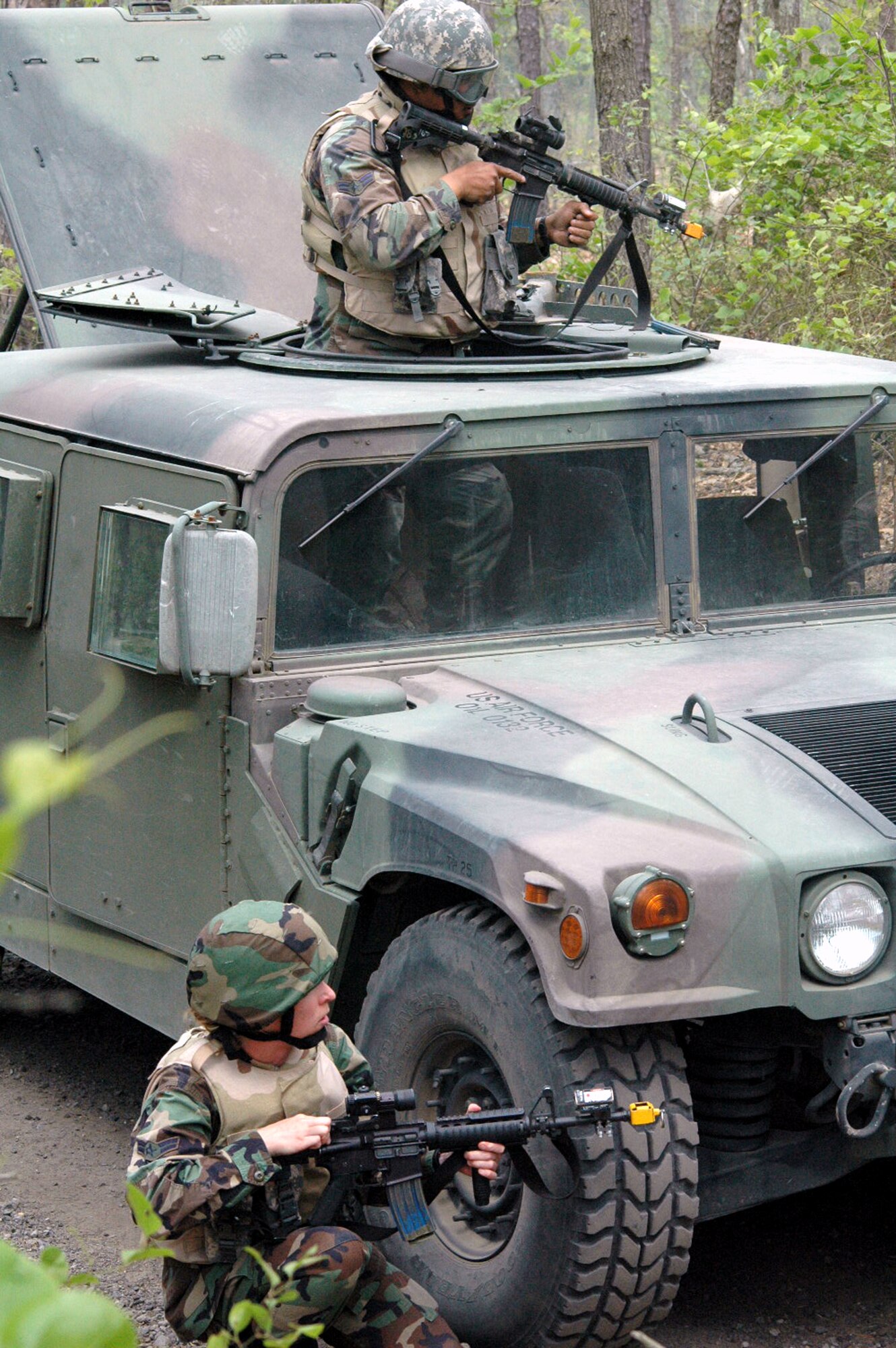 Students in the Air Force Phoenix Warrior Training Course respond to enemy fire during training in convoy operations for the course June 20, 2008, on a Fort Dix, N.J., range.  The course, taught by the U.S. Air Force Expeditionary Center's Expeditionary Operations School and 421st Combat Training Squadron, prepares security forces Airmen for upcoming deployments.  (U.S. Air Force Photo/Tech. Sgt. Scott T. Sturkol)