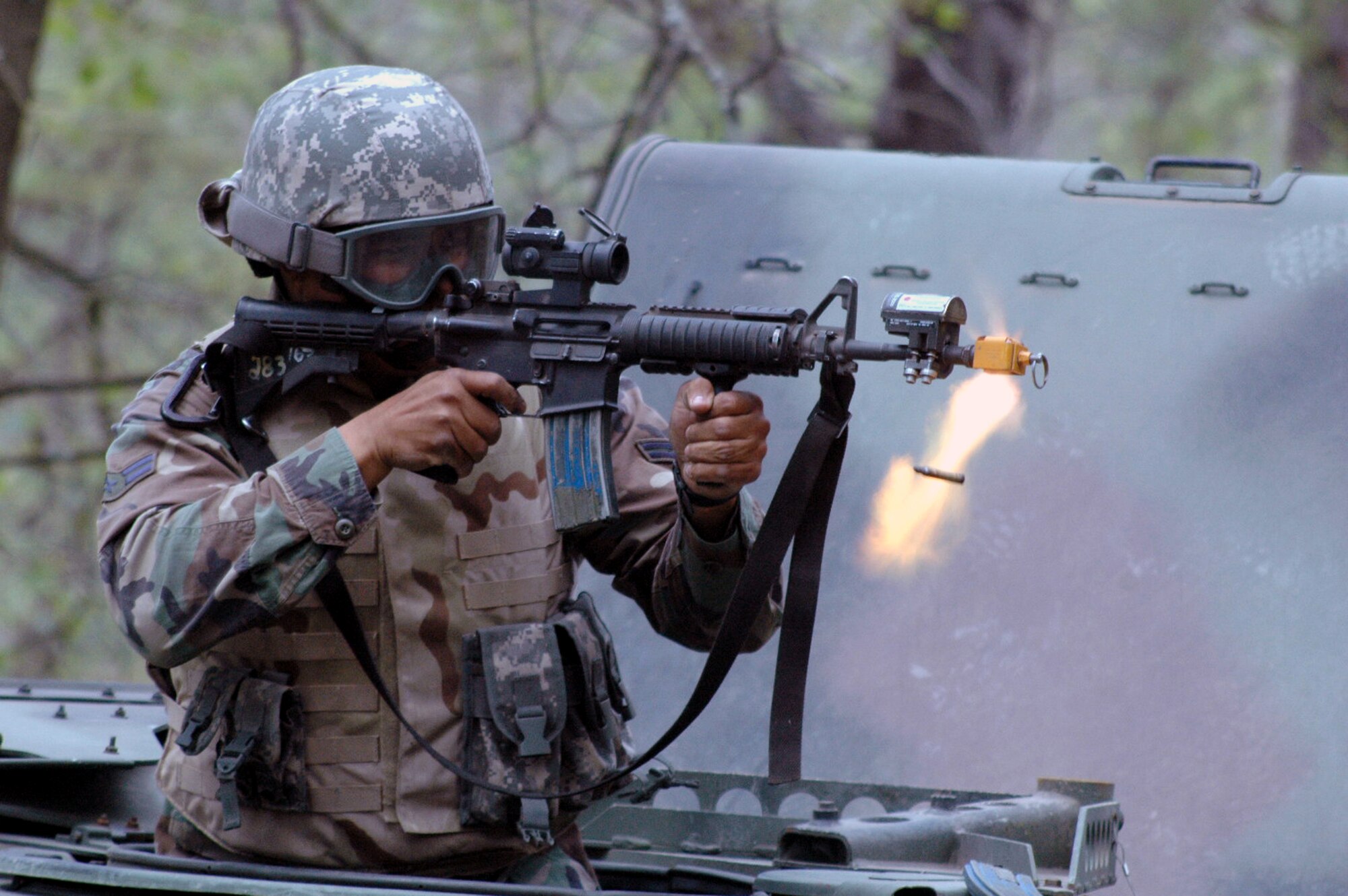 A student in the Air Force Phoenix Warrior Training Course responds to enemy fire during training in convoy operations for the course June 20, 2008, on a Fort Dix, N.J., range.  The course, taught by the U.S. Air Force Expeditionary Center's Expeditionary Operations School and 421st Combat Training Squadron, prepares security forces Airmen for upcoming deployments.  (U.S. Air Force Photo/Tech. Sgt. Scott T. Sturkol)