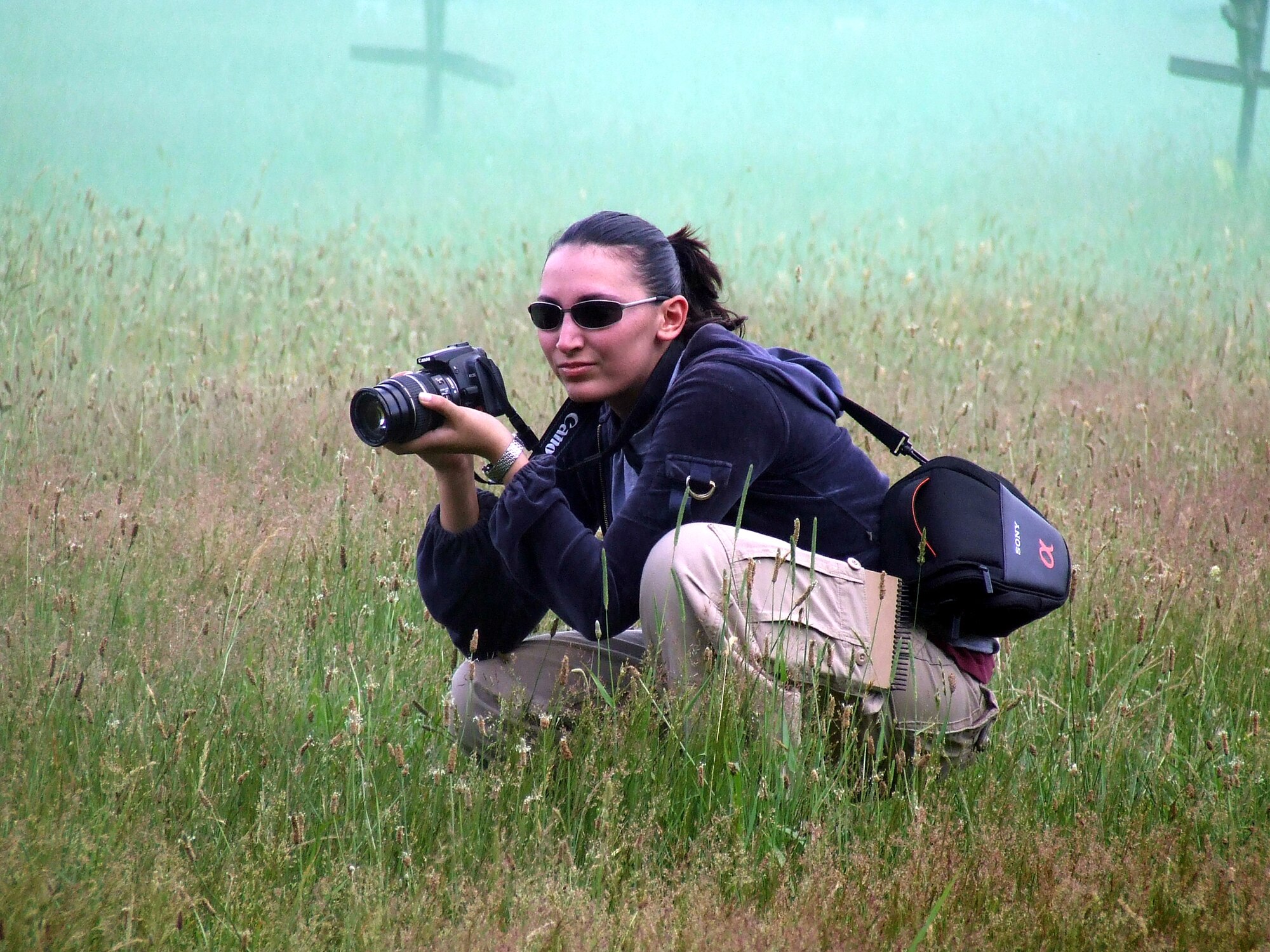 Tatiana El Khouri, an artist from Los Angeles, Calif., takes photos of combat first aid training for the Air Force Phoenix Warrior Training Course Jun 19, 2008, on a Fort Dix, N.J., range.  She was among five artists whio visited the U.S. Air Force Expeditionary Center and its training courses as part of an official visit with the Air Force Art Program.  Ms. El Khouri will eventually submit artwork to the program based off her experience and reference material gathered during the trip.  (U.S. Air Force Photo/Tech. Sgt. Scott T. Sturkol)