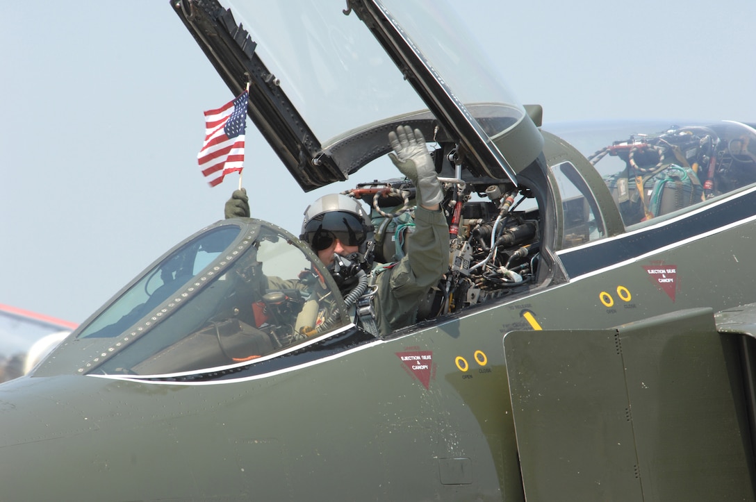 LANGLEY AIR FORCE BASE, Va. -- Lt. Col. Ronald Miller waves to the crowd from an F-4 E Phantom at AirPower over Hampton Roads June 22. Langley’s open house is an annual event that helps educate the public, increase recruiting and show appreciation to the local community. (U.S. Air Force photo/Tech. Sgt. April Wickes)