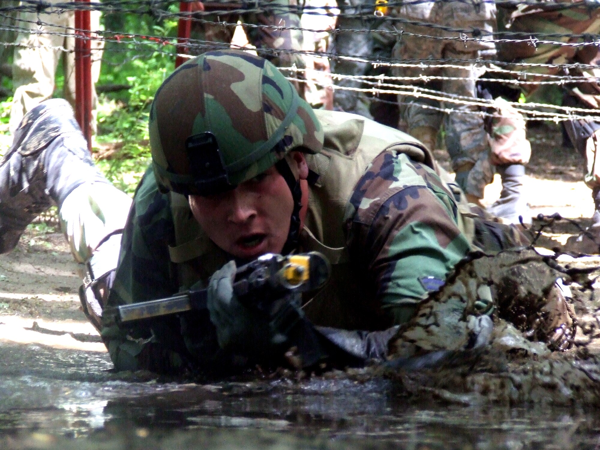Students in the Air Force Phoenix Warrior Training Course participate in a combat first aid  class on a Fort Dix, N.J., range June 19, 2008.  The course is taught by the U.S. Air Force Expeditionary Center's Expeditionary Operations School and 421st Combat Training Squadron and prepares security forces Airmen for upcoming deployments.  (U.S. Air Force Photo/Tech. Sgt. Scott T. Sturkol)