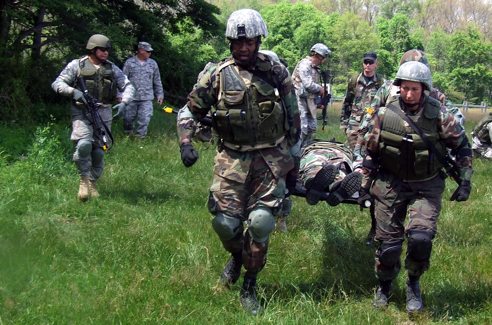 Students in the Air Force Phoenix Warrior Training Course participate in a combat first aid  class on a Fort Dix, N.J., range June 19, 2008.  The course is taught by the U.S. Air Force Expeditionary Center's Expeditionary Operations School and 421st Combat Training Squadron and prepares security forces Airmen for upcoming deployments.  (U.S. Air Force Photo/Tech. Sgt. Scott T. Sturkol)