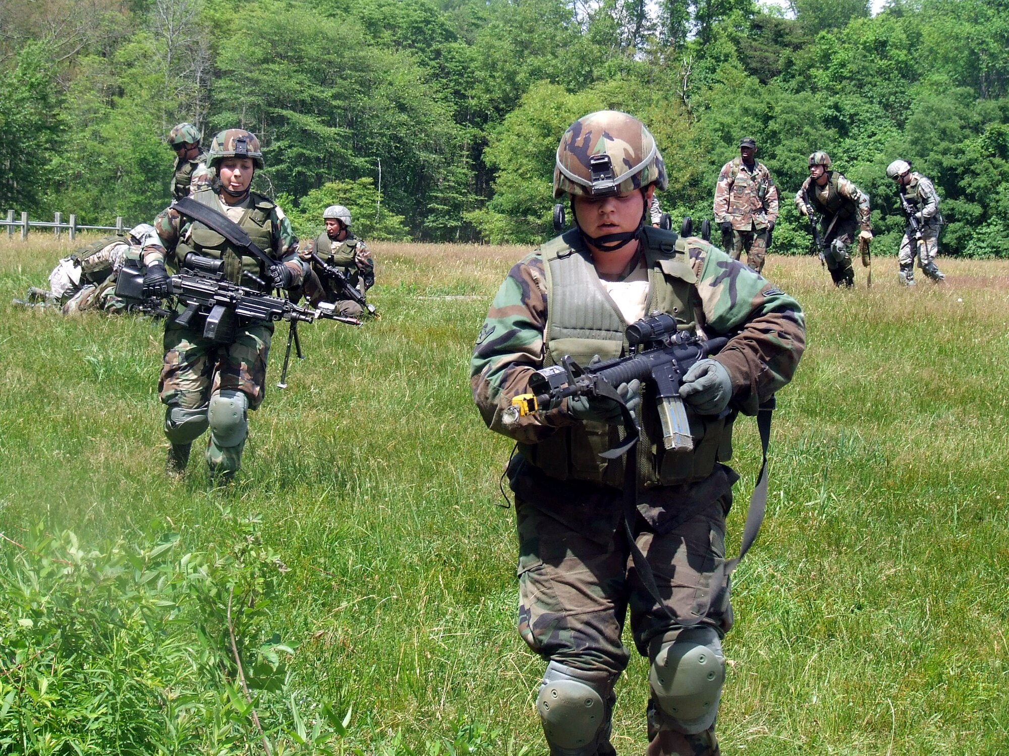 Students in the Air Force Phoenix Warrior Training Course participate in a combat first aid  class on a Fort Dix, N.J., range June 19, 2008.  The course is taught by the U.S. Air Force Expeditionary Center's Expeditionary Operations School and 421st Combat Training Squadron and prepares security forces Airmen for upcoming deployments.  (U.S. Air Force Photo/Tech. Sgt. Scott T. Sturkol)