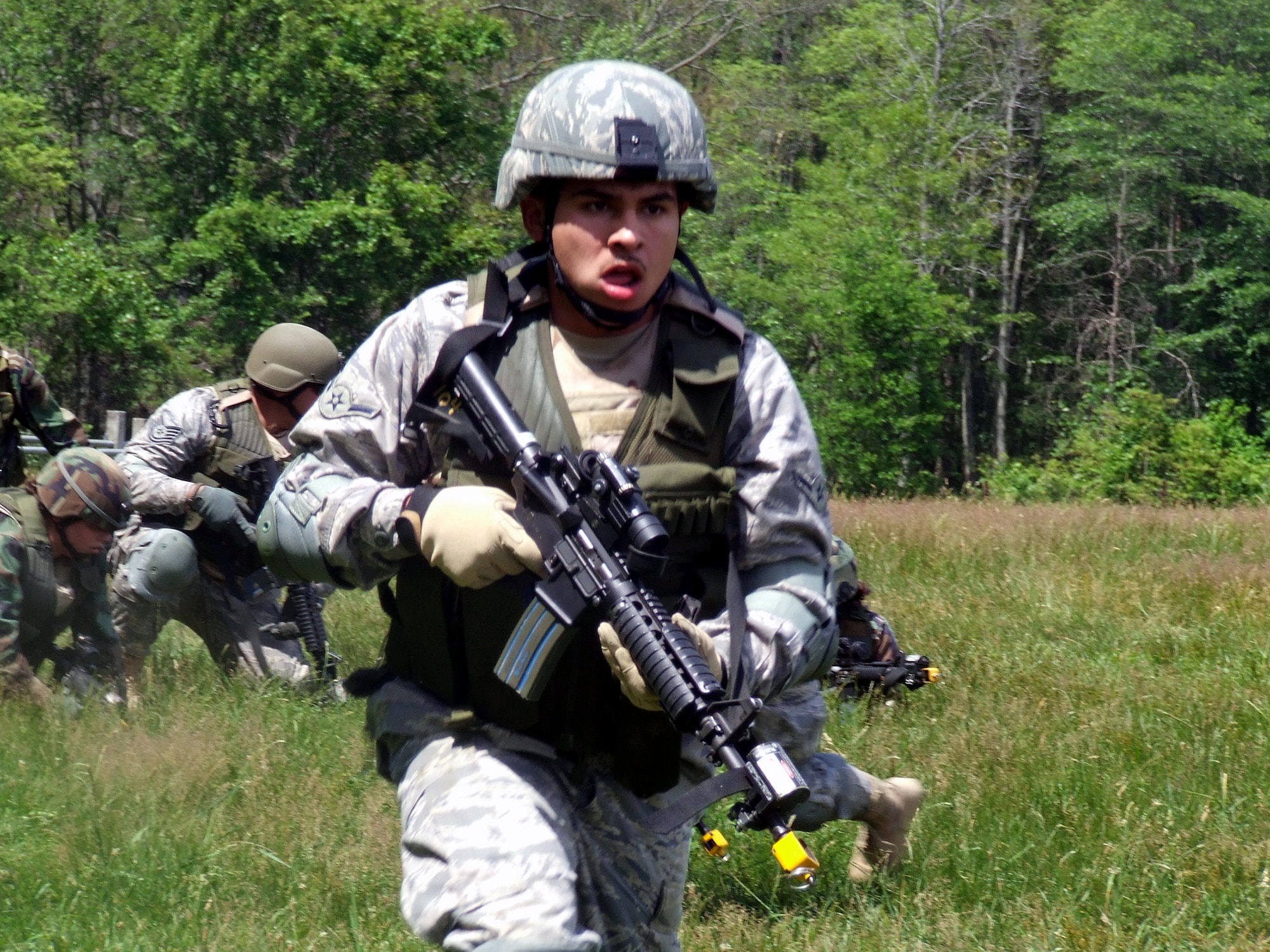 Students in the Air Force Phoenix Warrior Training Course participate in a combat first aid  class on a Fort Dix, N.J., range June 19, 2008.  The course is taught by the U.S. Air Force Expeditionary Center's Expeditionary Operations School and 421st Combat Training Squadron and prepares security forces Airmen for upcoming deployments.  (U.S. Air Force Photo/Tech. Sgt. Scott T. Sturkol)
