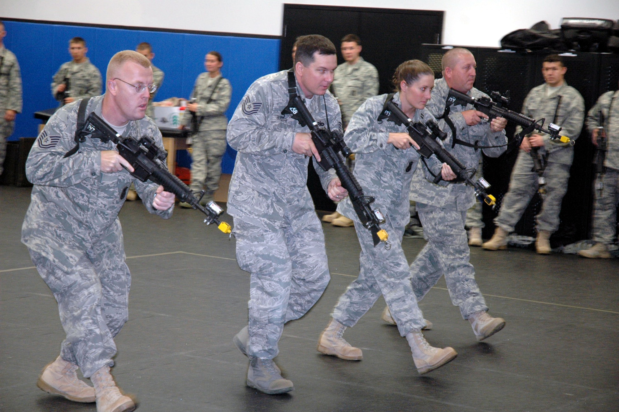 Students in the Air Force Phoenix Warrior Training Course participate in "tape drills" for training in mobile operations in urban terrain in the U.S. Air Force Expeditionary Center June 19, 2008, on Fort Dix, N.J.  The course, taught by the USAF EC's Expeditionary Operations School and the 421st Combat Training Squadron, prepares security forces Airmen for upcoming deployments.  (U.S. Air Force Photo/Tech. Sgt. Scott T. Sturkol)