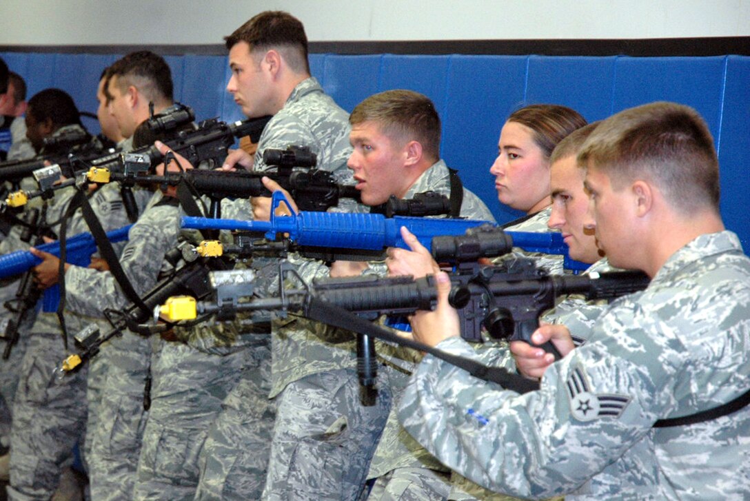 Students in the Air Force Phoenix Warrior Training Course participate in "tape drills" for training in mobile operations in urban terrain in the U.S. Air Force Expeditionary Center June 19, 2008, on Fort Dix, N.J.  The course, taught by the USAF EC's Expeditionary Operations School and the 421st Combat Training Squadron, prepares security forces Airmen for upcoming deployments.  (U.S. Air Force Photo/Tech. Sgt. Scott T. Sturkol)