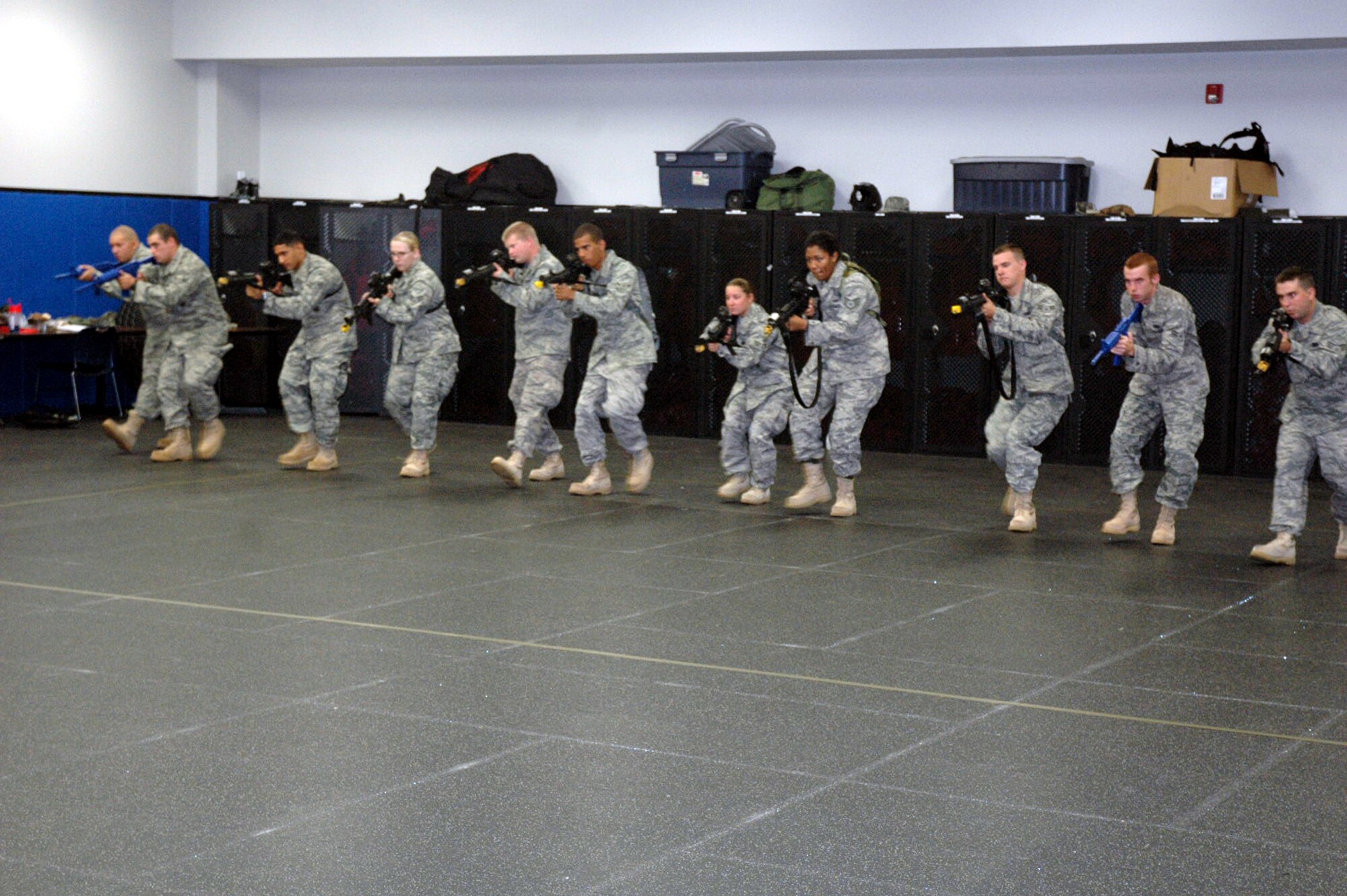 Students in the Air Force Phoenix Warrior Training Course participate in "tape drills" for training in mobile operations in urban terrain in the U.S. Air Force Expeditionary Center June 19, 2008, on Fort Dix, N.J.  The course, taught by the USAF EC's Expeditionary Operations School and the 421st Combat Training Squadron, prepares security forces Airmen for upcoming deployments.  (U.S. Air Force Photo/Tech. Sgt. Scott T. Sturkol)