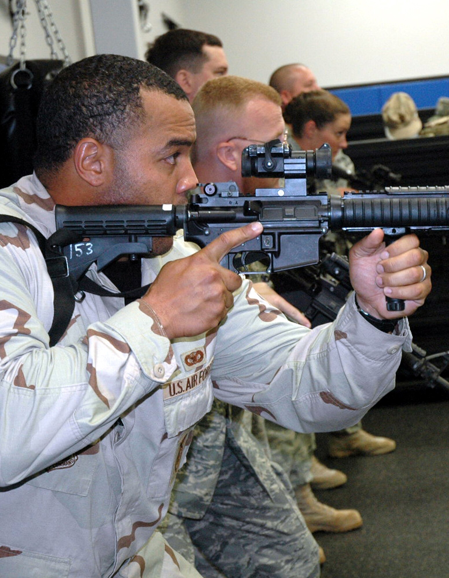 Students in the Air Force Phoenix Warrior Training Course participate in "tape drills" for training in mobile operations in urban terrain in the U.S. Air Force Expeditionary Center June 19, 2008, on Fort Dix, N.J.  The course, taught by the USAF EC's Expeditionary Operations School and the 421st Combat Training Squadron, prepares security forces Airmen for upcoming deployments.  (U.S. Air Force Photo/Tech. Sgt. Scott T. Sturkol)