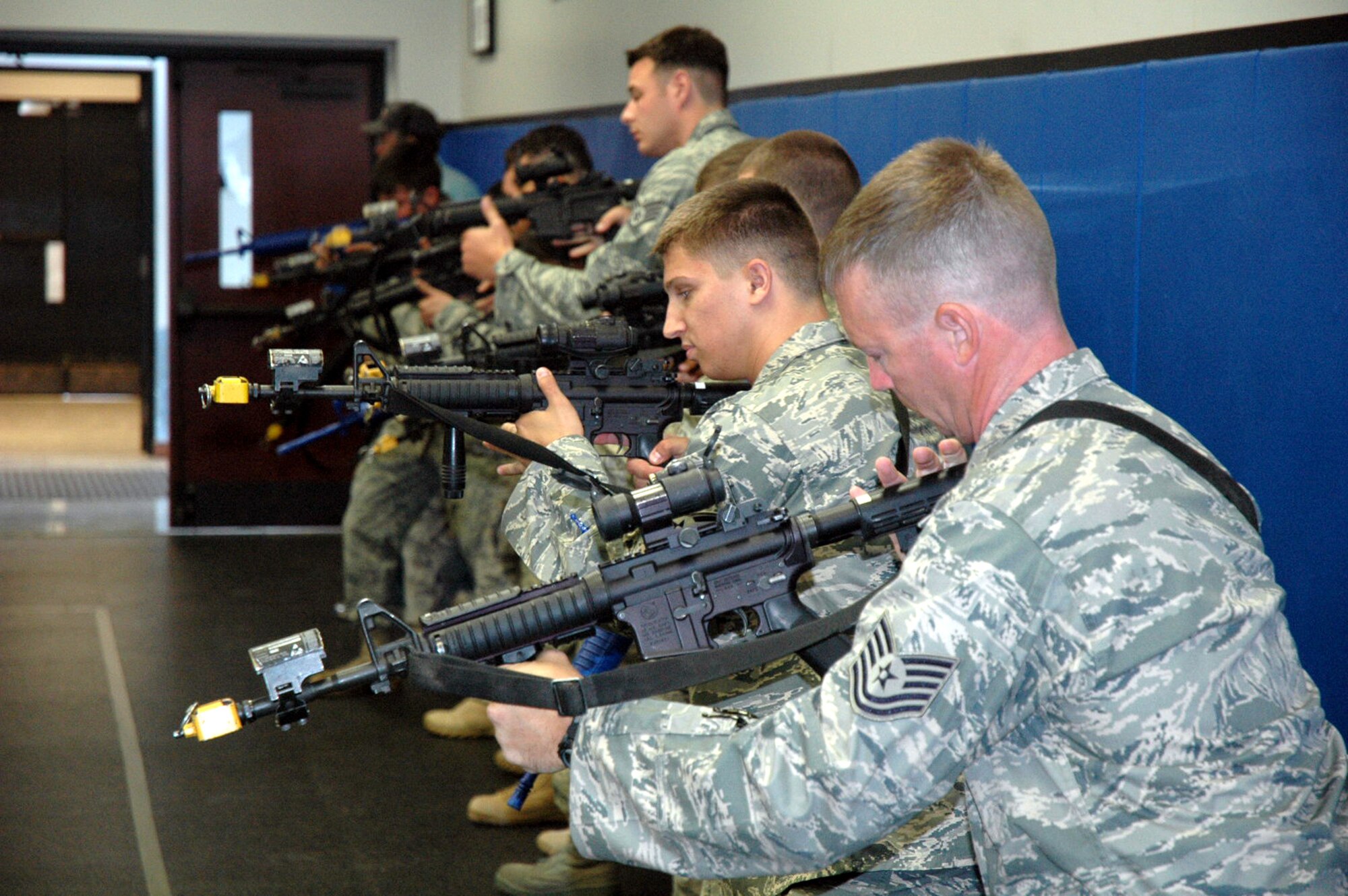 Students in the Air Force Phoenix Warrior Training Course participate in "tape drills" for training in mobile operations in urban terrain in the U.S. Air Force Expeditionary Center June 19, 2008, on Fort Dix, N.J.  The course, taught by the USAF EC's Expeditionary Operations School and the 421st Combat Training Squadron, prepares security forces Airmen for upcoming deployments.  (U.S. Air Force Photo/Tech. Sgt. Scott T. Sturkol)