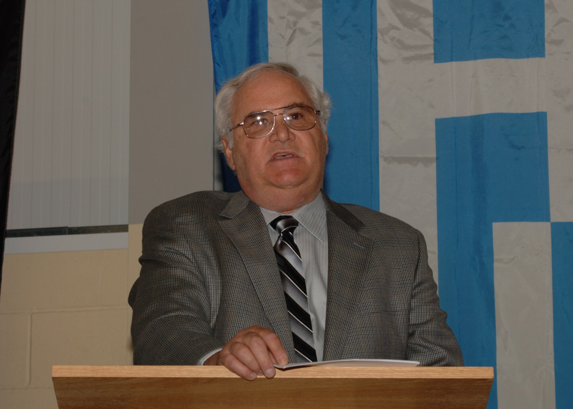 Mr. Gary Moncur speaks on preservation of the legacy of the 303rd Bomb Group (Heavy) during a 5 June professional development seminar at Royal Air Force Molesworth.  Mr. Moncur was visiting the base with his family following in the footsteps of his father LT Vern Moncur who flew the B-17 "Thunderbird" from this base in 1943 - 1944.  In 29 combat missions over Nazi occupied Europe the plane sustained substantial damage, but all crewmemebers came through unscathed.  (U.S. Air Force Photo by Technical Sgt. Casey  J. Martin)