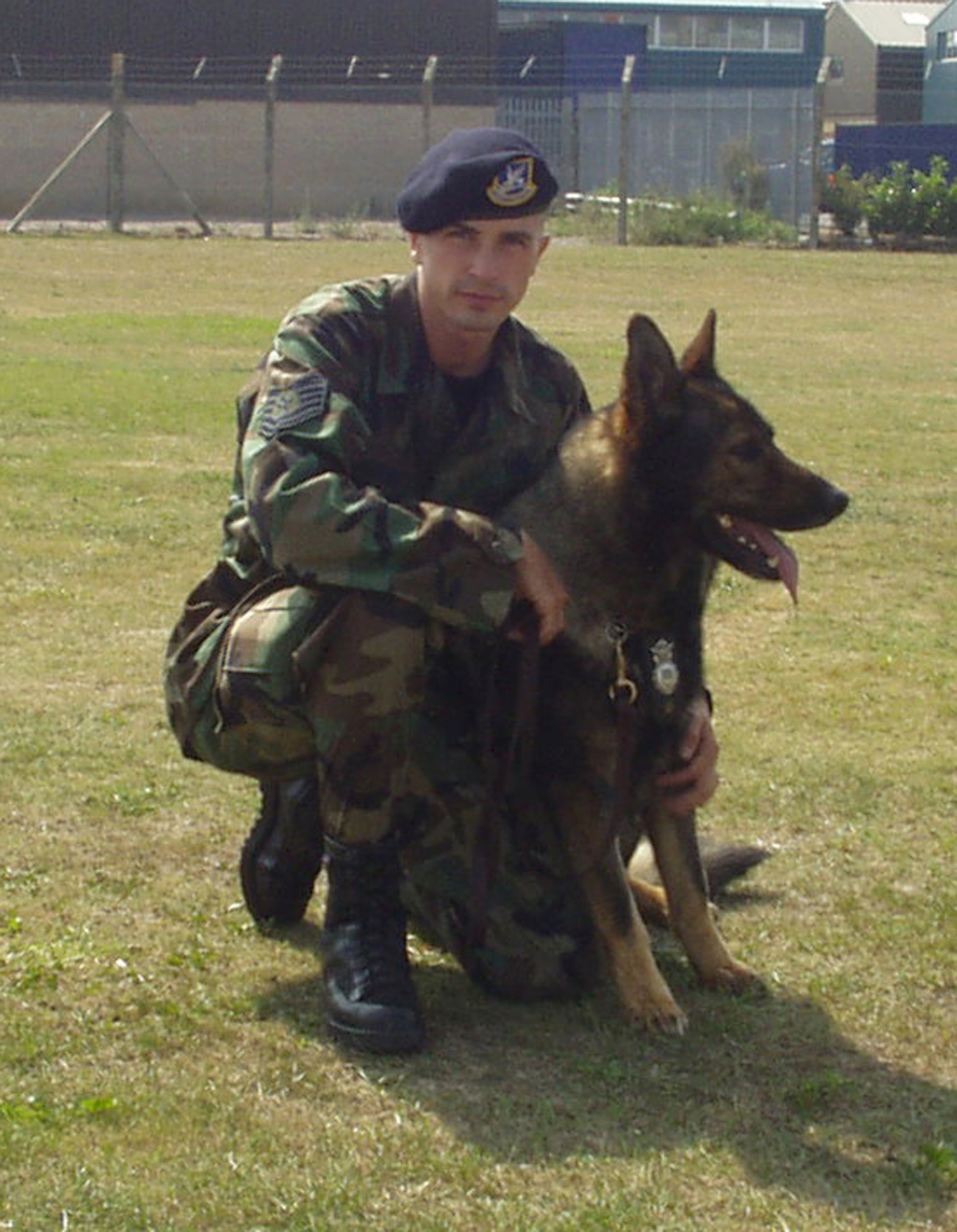 Then-Tech. Sgt. Matthew Haydel was War's handler from 2002 to 2004. He worked with 10 dogs and said War was by far the best he'd ever handled. "He just had a very cool personality, and a way about him. He was fun to work with, was very intuitive and picked things up very quickly; War was a great dog to handle," he said.  (Courtesy photo)      