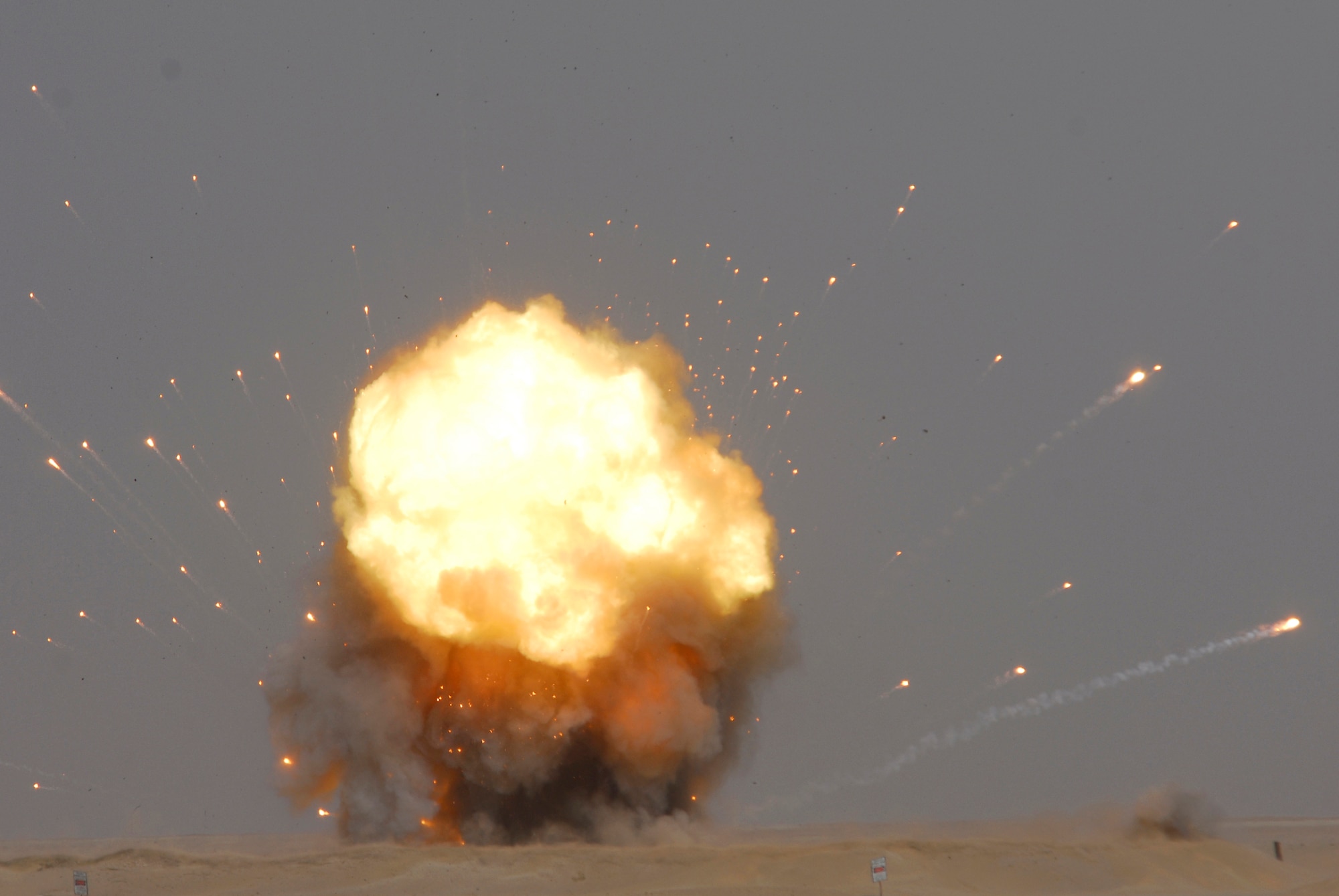 SOUTHWEST ASIA -- A fire ball rises into the sky during a controlled detonation performed by coalition forces from the Air Force?s 386th Expeditionary Civil Engineer Squadron and the Australian Army June 20, 2008, at an explosive ordnance disposal range in the Persian Gulf Region. The joint detonation also provided an opportunity for the coalition forces to enhance relations while learning some of the slight differences in operating procedures. (U.S. Air Force photo/ Staff Sgt. Patrick Dixon)
