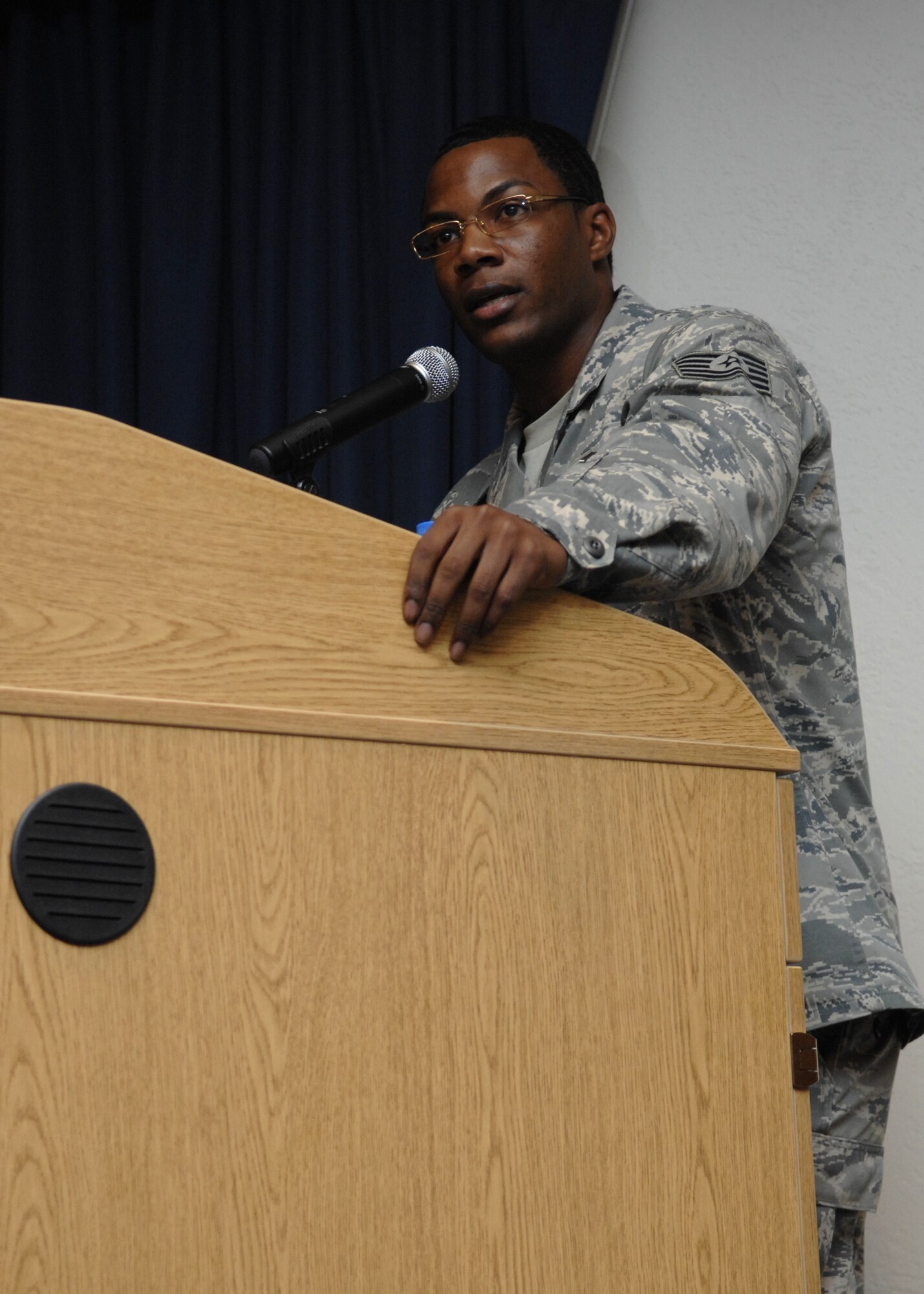 Tech. Sgt. Bruce Harrison, 49th Logistics Readiness Squadron, speaks of his experience in Iraq where he led a team of 30 U.S. Air Force and Iraqi Force confinement officers for eight months at Camp Bucca Prison Iraq, during Warrior Call, June 20 at the Desert Sands Enlisted Club at Holloman Air Force Base, N.M. (U.S. Air Force photo/Airman 1st Class Rachel A. Kocin)