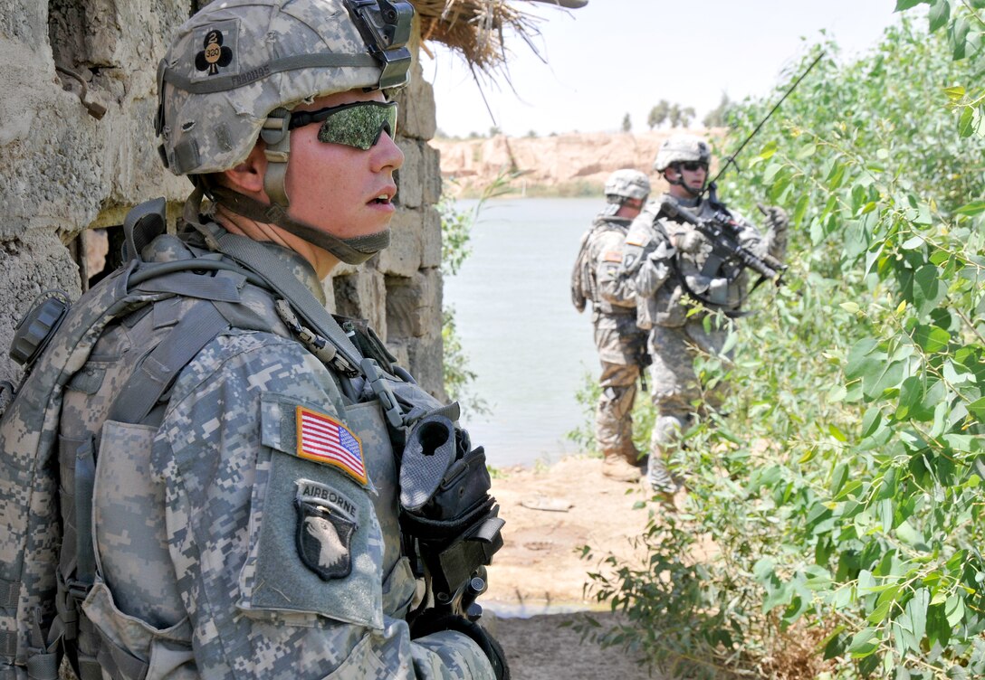 U.S. Army Spc. Sean G. Boening pulls security during a combat patrol near the Tigris River, June 20, 2008.  Boening is a radio and telephone operator assigned to the 2nd Battalion, 320th Field Artillery Regiment, 1st Brigade Combat Team, 101st Airborne Division.


