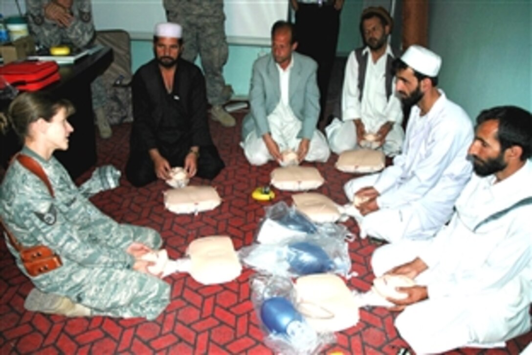 U.S. Air Force Staff Sgt. Janine Duschka teaches infant Cardio Pulmonary Resuscitation to Afghan medical providers during a CPR class, June 18, 2008, at the Rokha Clinic in Panjshir province, Afghanistan. Duschka is a Panjshir Provincial Reconstruction Team medical technician. 
