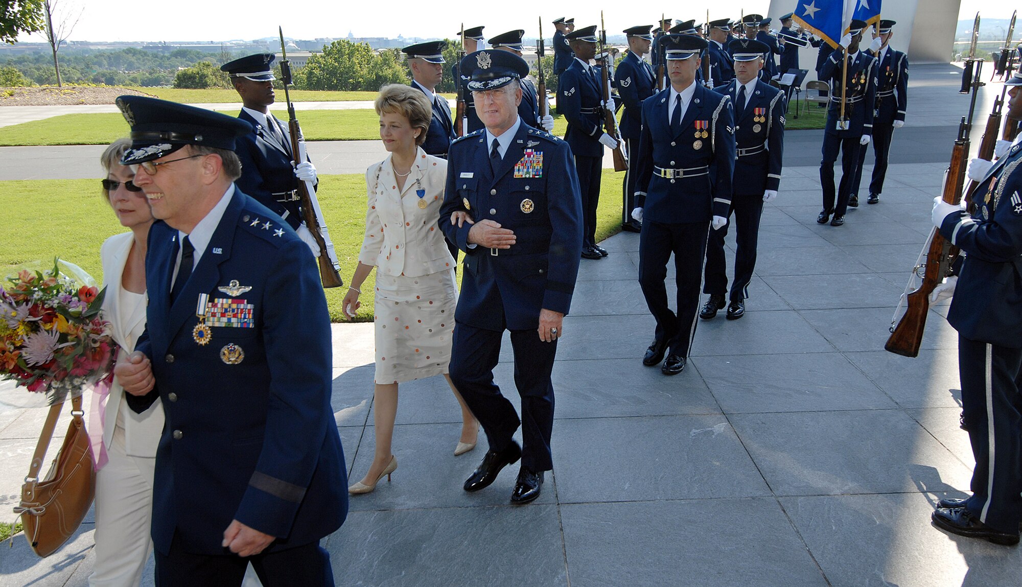 Lt. Gen. Charles E. Stenner Jr., chief of Air Force Reserve and commander Air Force Reserve Command, and his wife Dee,  are followed by Lt. Gen. John A. Bradley and his wife Jan, June 24, 2008, following change of command ceremonies for the Air Force Reserve Command at the Air Force Memorial in Washington D.C. (U.S. Air Force photo/Master Sgt. Rick Sforza)