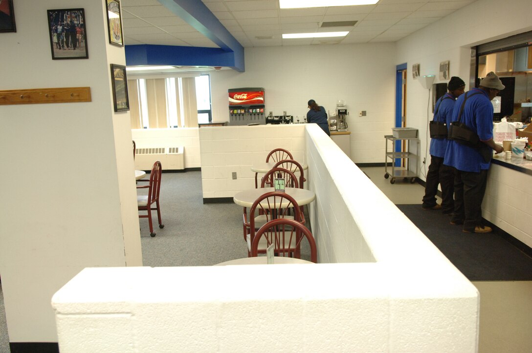 Customers of Bandit Lanes order food at Lane 17, the bowling alley snack bar, which is due for renovations June 30 to July 17. The renovations will push back the small brick wall seen above to make space for a new salad bar which will also hold various "grab and go" items. Bandit Lanes and Lane 17 operations are set for normal operations beginning June 18. (U.S. Air Force photo/Airman 1st Class Adam Grant)