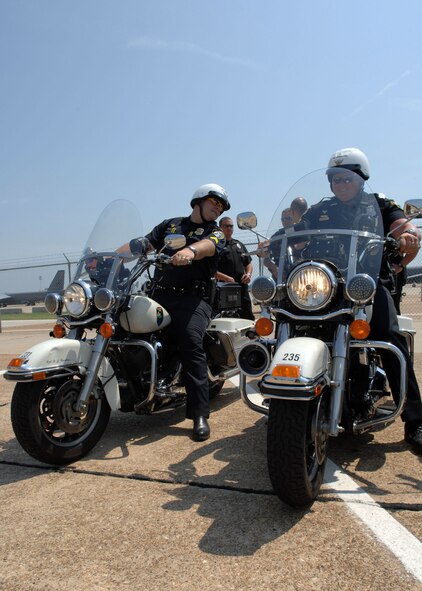 BARKSDALE AIR FORCE BASE, La. -- Members of the Shreveport and Bossier Police Department participate in the Motorcycle Safety Fair here on June 18. The fair was held to promote motorcycle safety during the 101 critical days of summer. (U.S. Air Force photo by Airman 1st Class Brittany Y. Bateman)