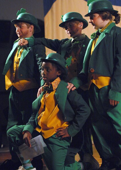 BARKSDALE AIR FORCE BASE, La.-  Cast members from the Missoula Children's Theater's production of "The Princess and The Pea" perform on stage in front of a live audience at the Stripes Lounge 20 June 2008. The cast is made up of children from the base Youth Center as well as school aged kids from the Barksdale AFB community. (U.S. Air Force photo by Airman 1st Class Brittany Y. Bateman)