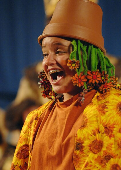 BARKSDALE AIR FORCE BASE, La.-  Cast members from the Missoula Children's Theater's production of "The Princess and The Pea" perform on stage in front of a live audience at the Stripes Lounge 20 June 2008. The cast is made up of children from the base Youth Center as well as school aged kids from the Barksdale AFB community. (U.S. Air Force photo by Airman 1st Class Brittany Y. Bateman)