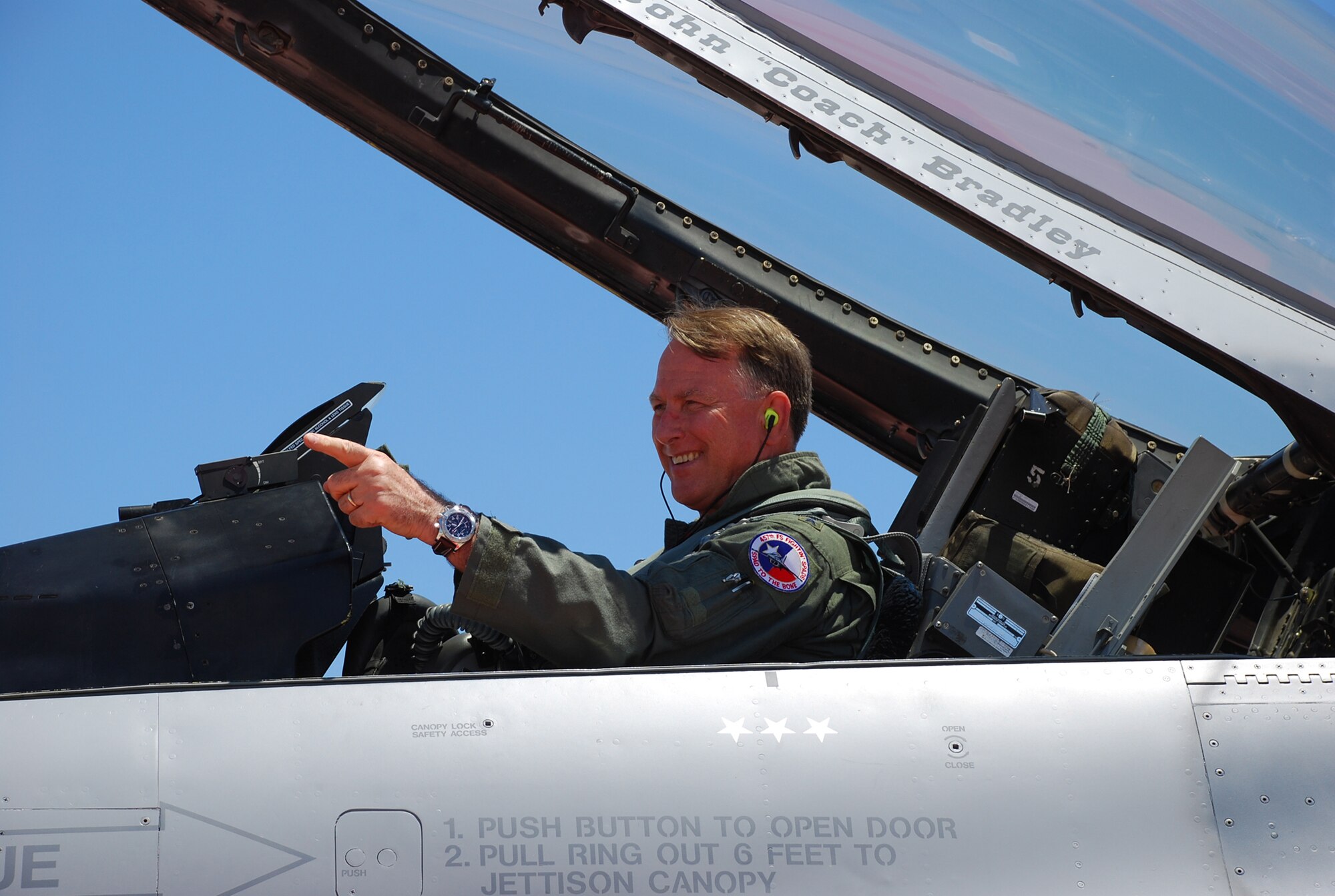 Lt Gen John "Coach" Bradley, Air Force Reserve Command commander, bids farwell to some old friends who came to watch his final F-16 flight at the Naval Air Station Fort Worth Joint Reserve Base Carswell Field, Texas. General Bradley completed his flying career Friday, June 20, 2008, logging in over 7053 total flight hours, many with the 457th Fighter Squadron Fighting Spads here. (U.S Air Force Photo/Tech. Sgt. Julie Briden-Garcia)