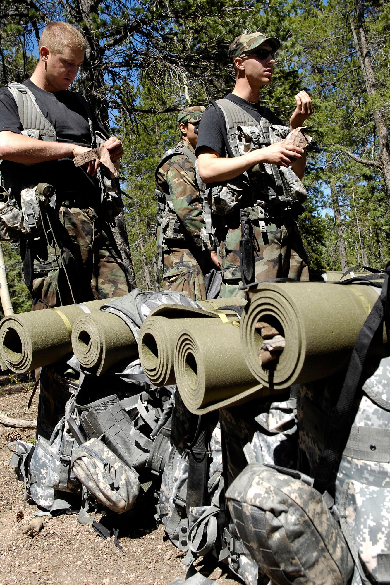 Air Force Academy Cadets 2nd Class Cory Tintzman and Evan Robinson take a break during Combat Survival Training June 9 in Saylor Park in Colo. More than 600 cadets are being trained as instructors in survival, evasion, resistance and escape tactics during the 2008 summer period. (U.S. Air Force photo/Mike Kaplan) 
