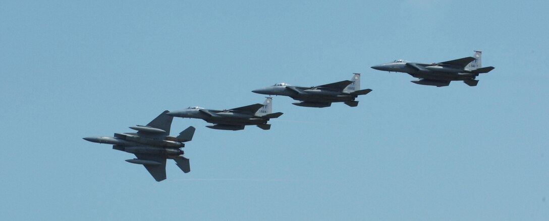 LANGLEY AIR FORCE BASE, Va. --Four F-15E Eagles fly in formation during Air Power over Hampton Roads here June 22. Langley's open house is an annual event that helps educate the public, increase recruiting and show its appreciation to the local community. (U.S. Air  Force photo/Airman Rebecca Montez)