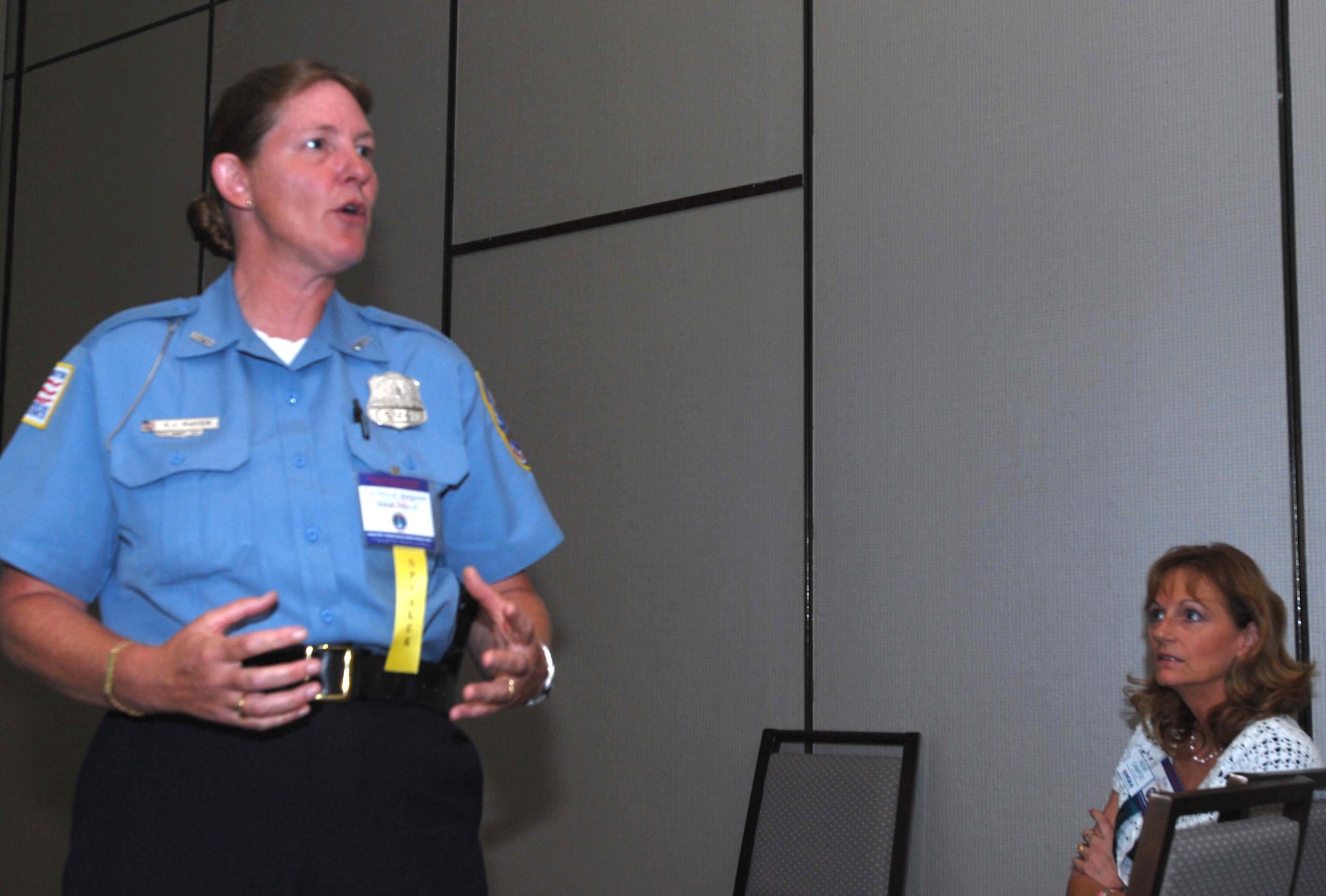 WASHINGTON -- Tech. Sgt. Susan Mayer, 459th Air Refueling Wing Military Equal Opportunity Office, briefs women veterans from around the country at the Westin Grand Hotel here June 21. Sergeant Mayer, who is also an officer with the Metropolitan Police Department, returned from Al Udeid, United Arab Emirates, last year and has recently graduated from the police academy. (U.S. Air Force photo/Tech. Sgt. Amaani Lyle)