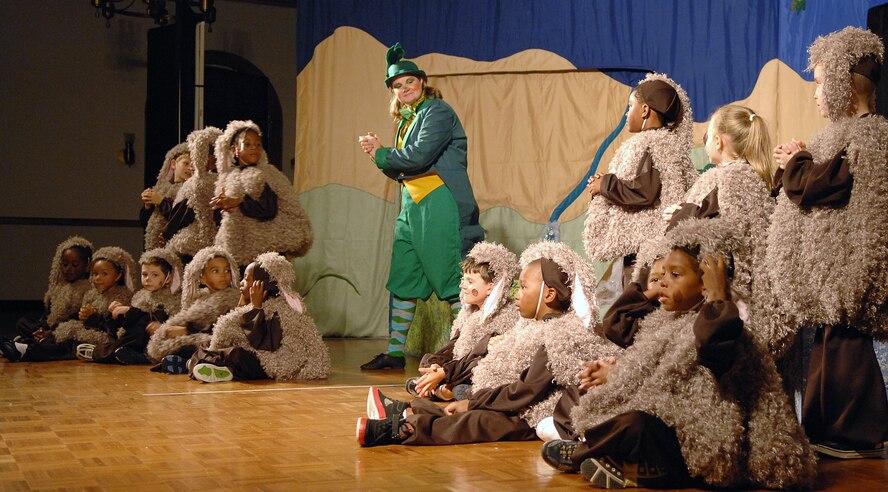 BARKSDALE AFB, LA--- Cast members from the Missoula Children's Theater's production of "The Princess and The Pea" perform on stage in front of a live audience at the Stripes Lounge 20 June 2008. The cast is made up of children from the base Youth Center as well as school aged kids from the Barksdale AFB community. (USAF Photo by SSgt Trina R. Jeanjacques)(Released)