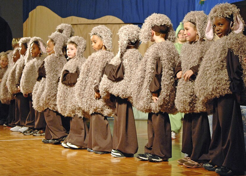 BARKSDALE AFB, LA--- Cast members from the Missoula Children's Theater's production of "The Princess and The Pea" perform on stage in front of a live audience at the Stripes Lounge 20 June 2008. The cast is made up of children from the base Youth Center as well as school aged kids from the Barksdale AFB community. (USAF Photo by SSgt Trina R. Jeanjacques)(Released)
