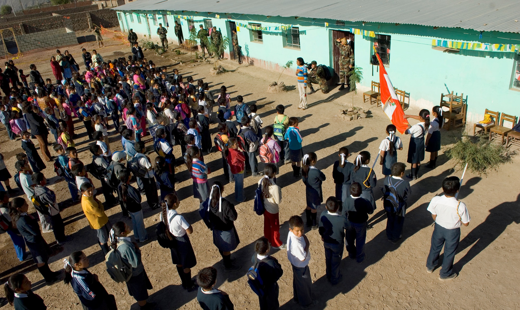 Peruvian children line up for  free medical, dental and eye care June 23 at a schoolhouse in Ayacucho, Peru. American servicemembers are providing medical care during New Horizons-Peru 2008, a U.S. and Peruvian partnered humanitarian mission set on providing relief to underprivileged Peruvians. (U.S. Air Force photo/Staff Sgt. Bennie J. Davis III)