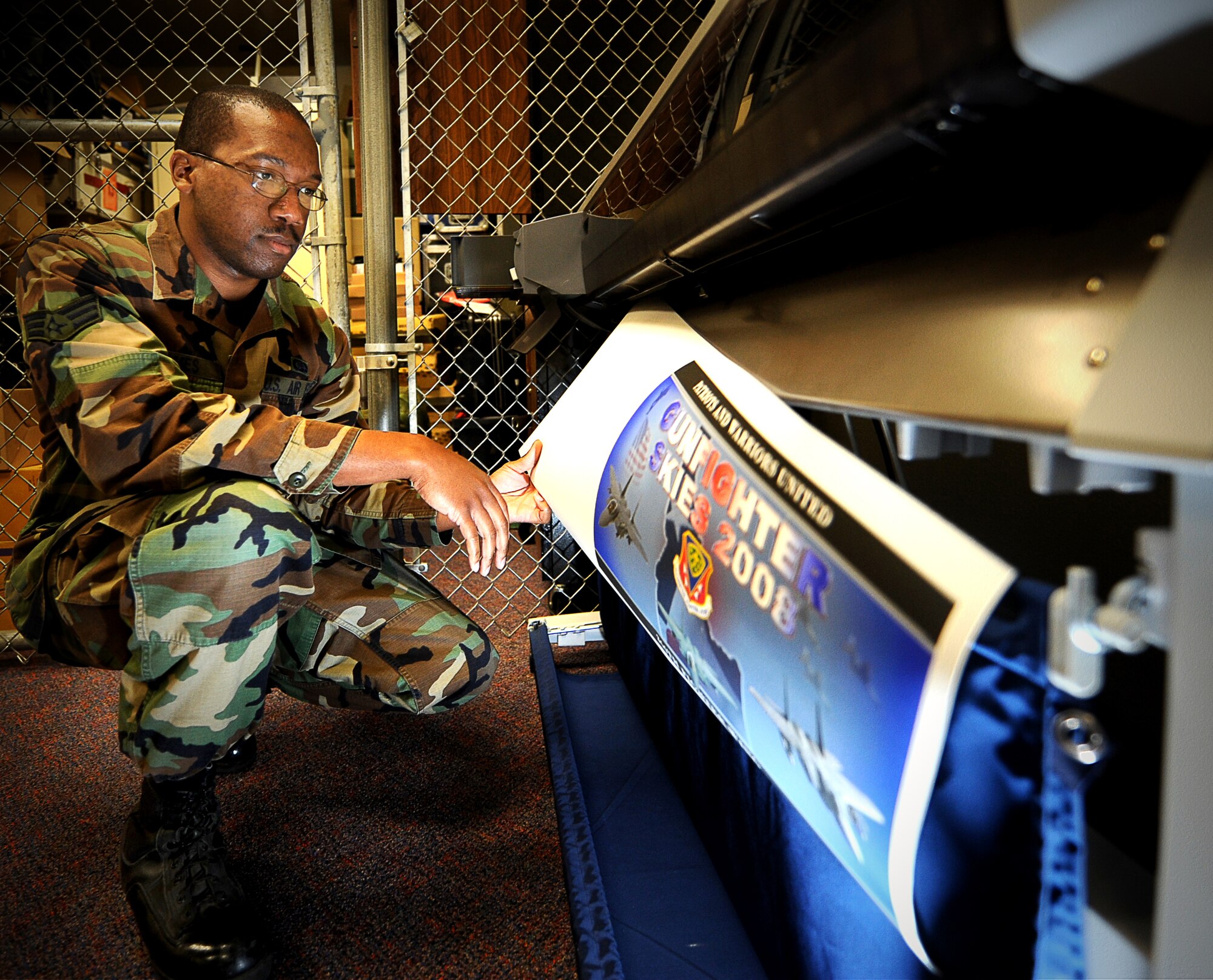 MOUNTAIN HOME AIR FORCE BASE, Idaho - Senior Airman Brandaun James works as a graphic artist for the 366th Fighter Wing Public Affairs Office. (U.S. Air force photo/ Airman 1st Class Stephany Miller)